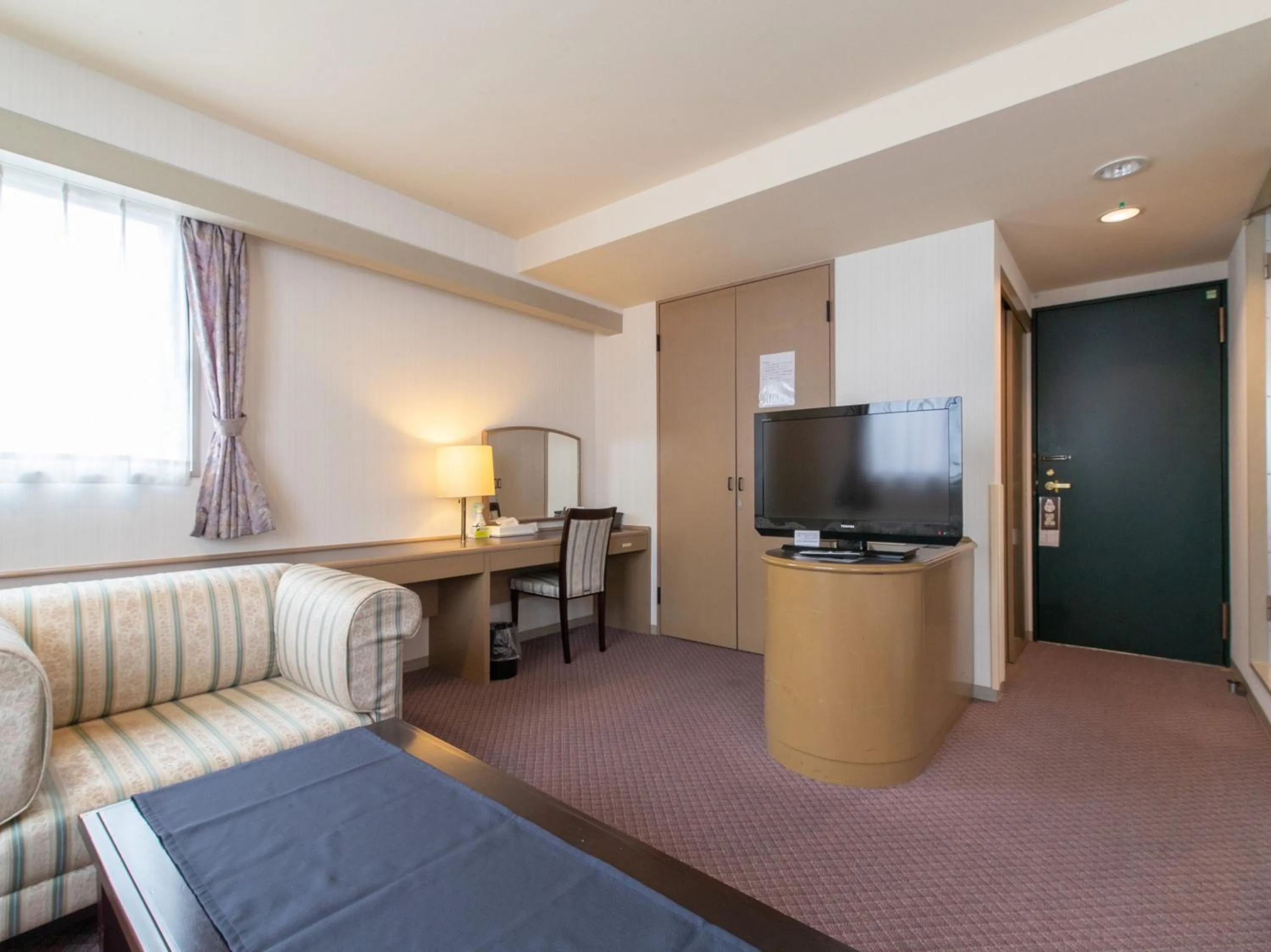 Bed in Nagasaki Orion Hotel