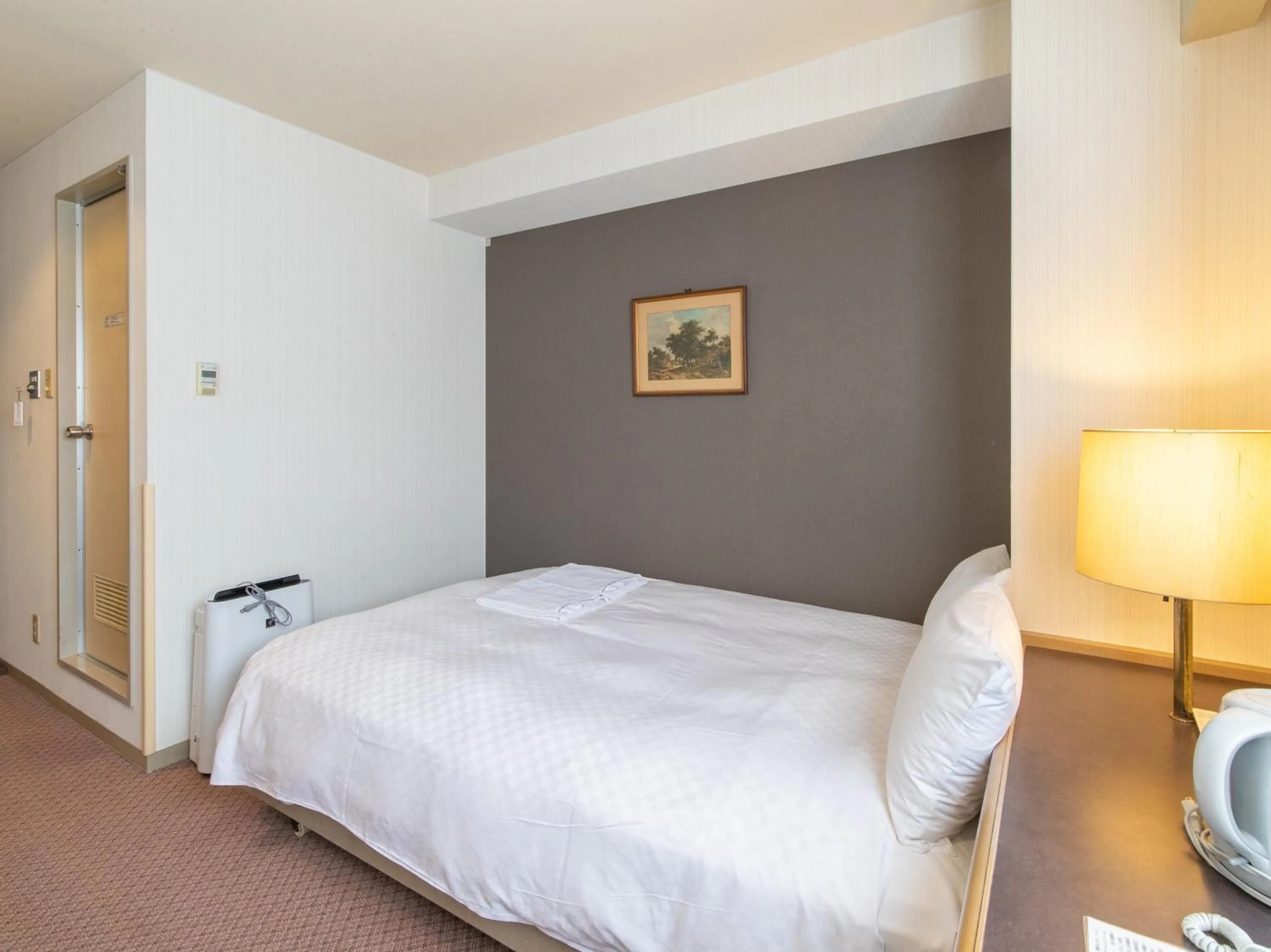 Bed in Nagasaki Orion Hotel