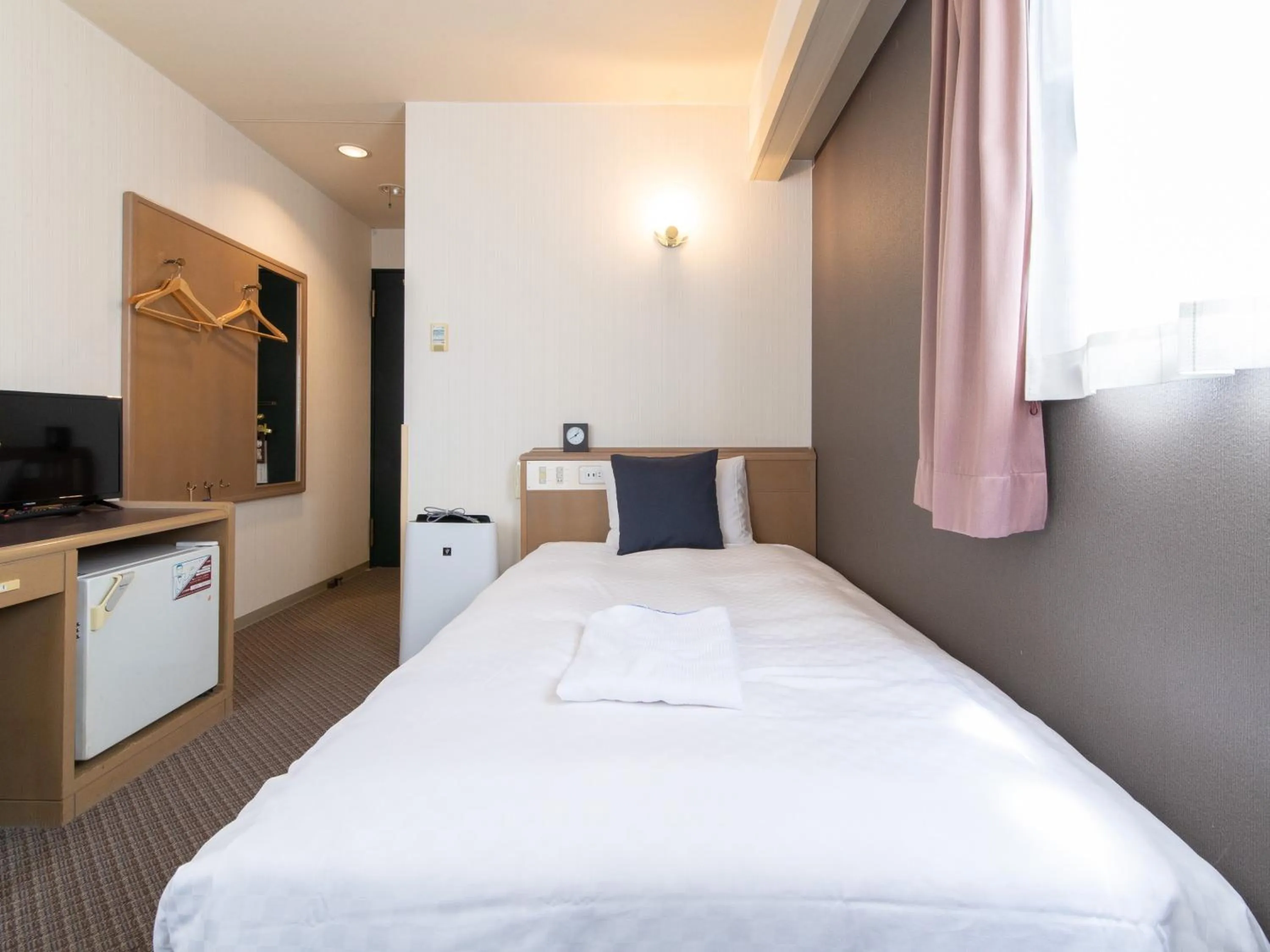 Bed in Nagasaki Orion Hotel