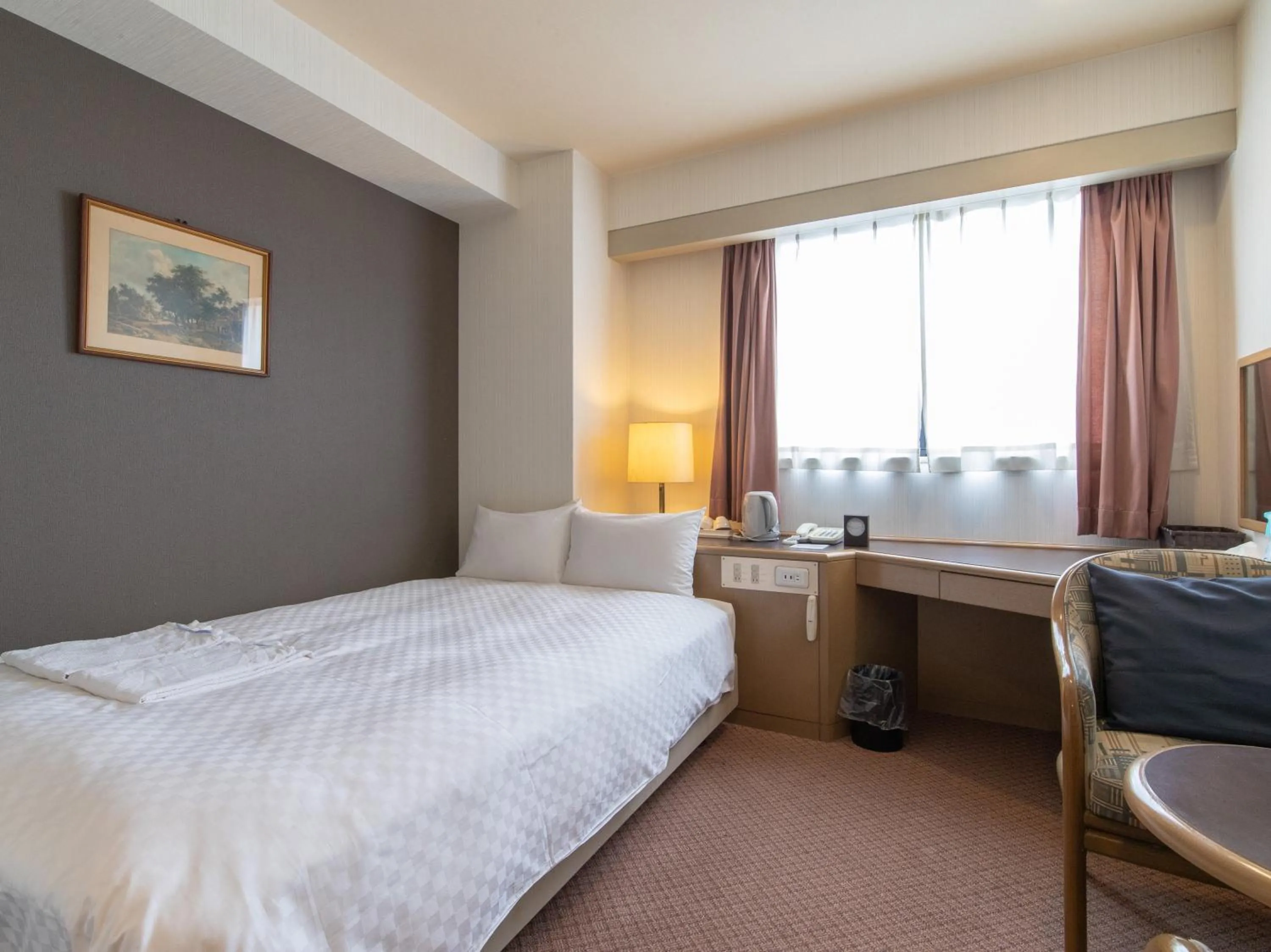 Bed in Nagasaki Orion Hotel