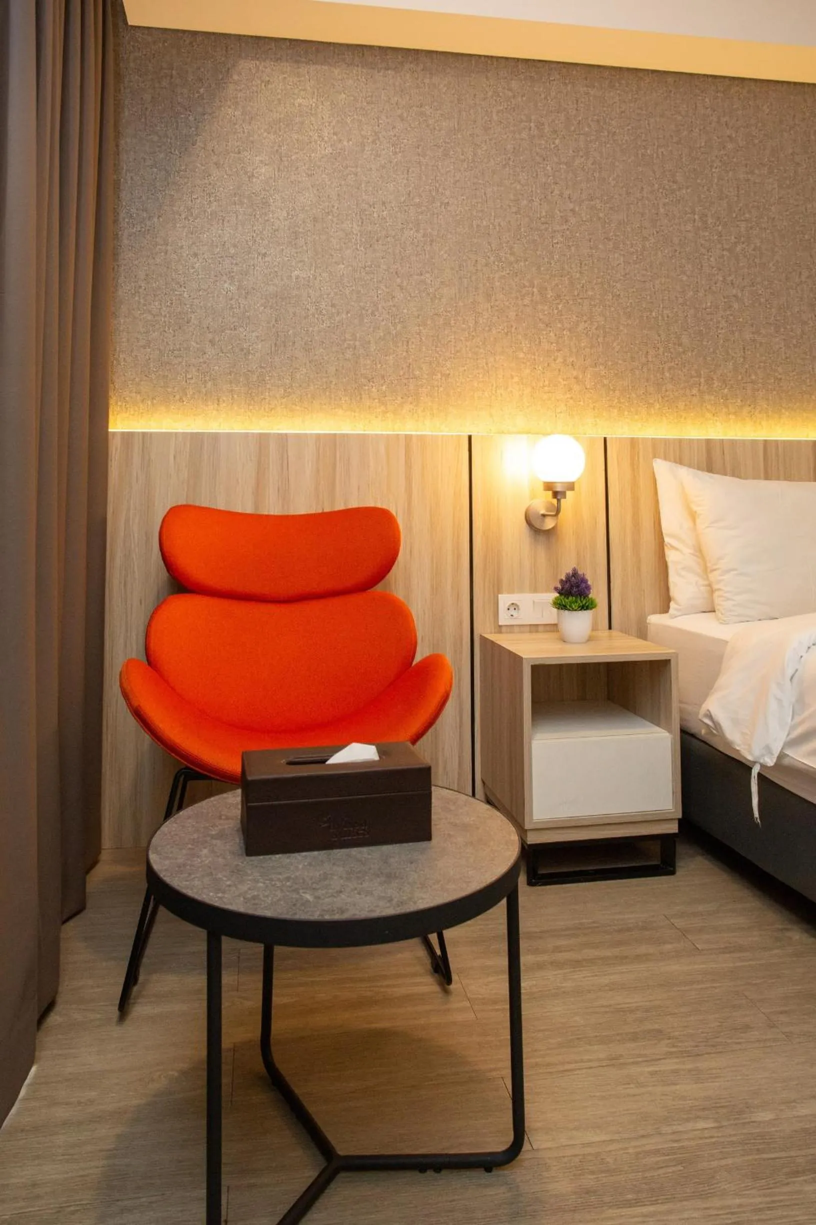 Seating area, Bed in Avissa Suites