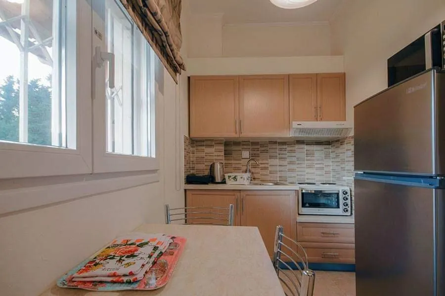 Dining area in BELLA De LUX APTS