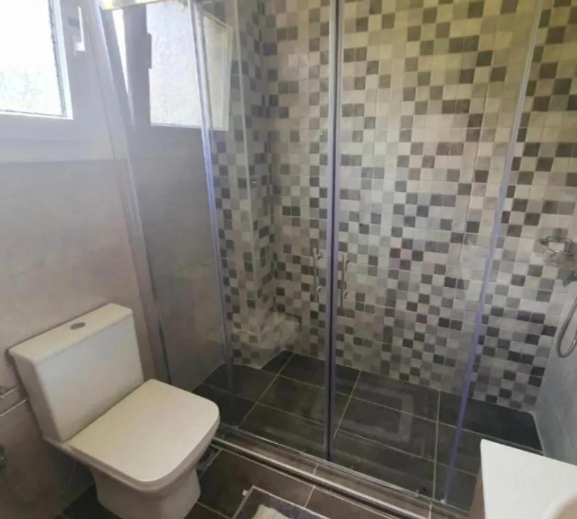 Bathroom in BELLA De LUX APTS