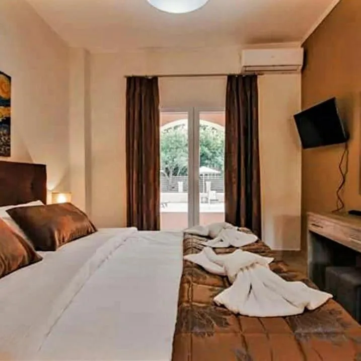 Bed in BELLA De LUX APTS