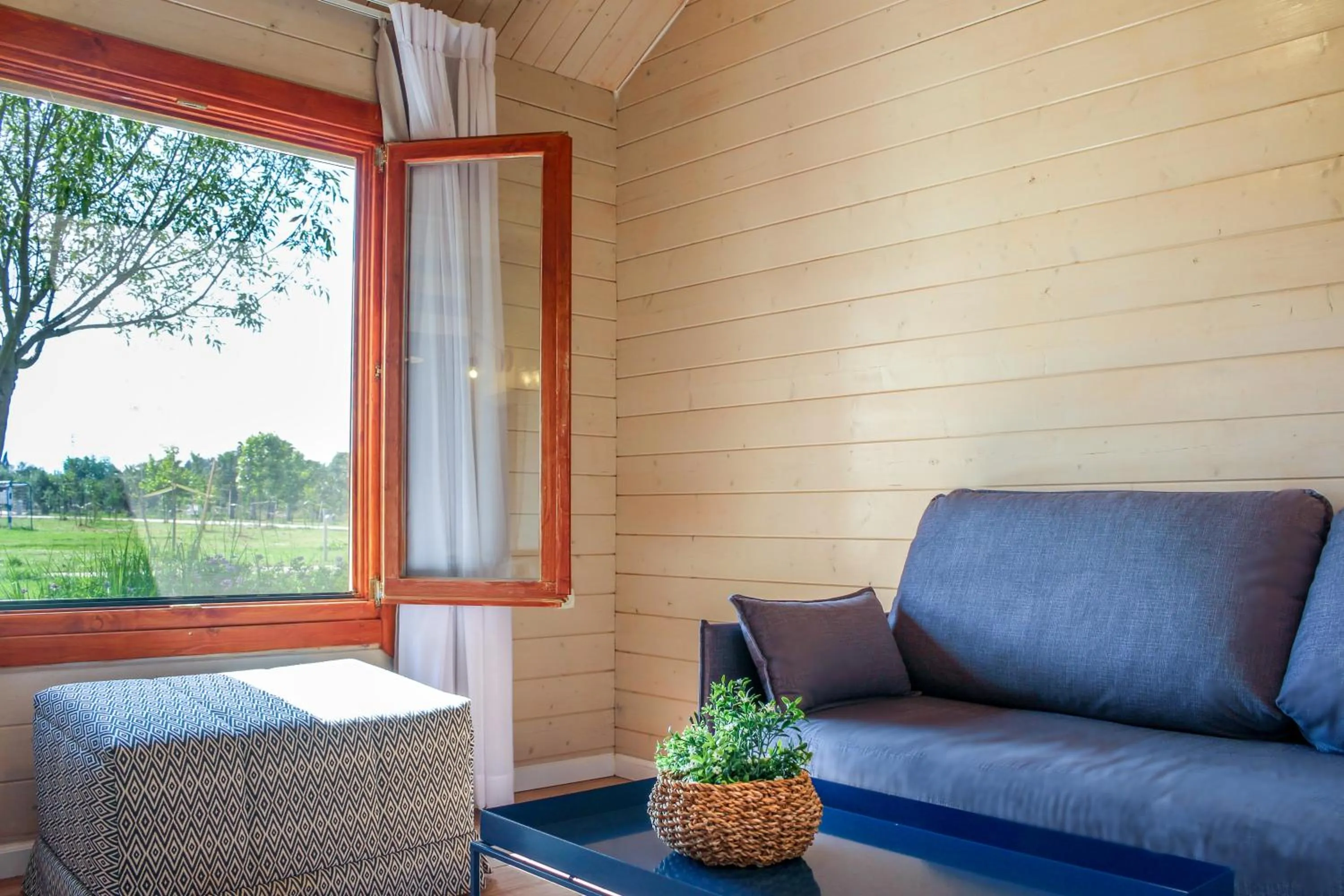 Seating area in The Village- Jordan Riverside Travel Hotel