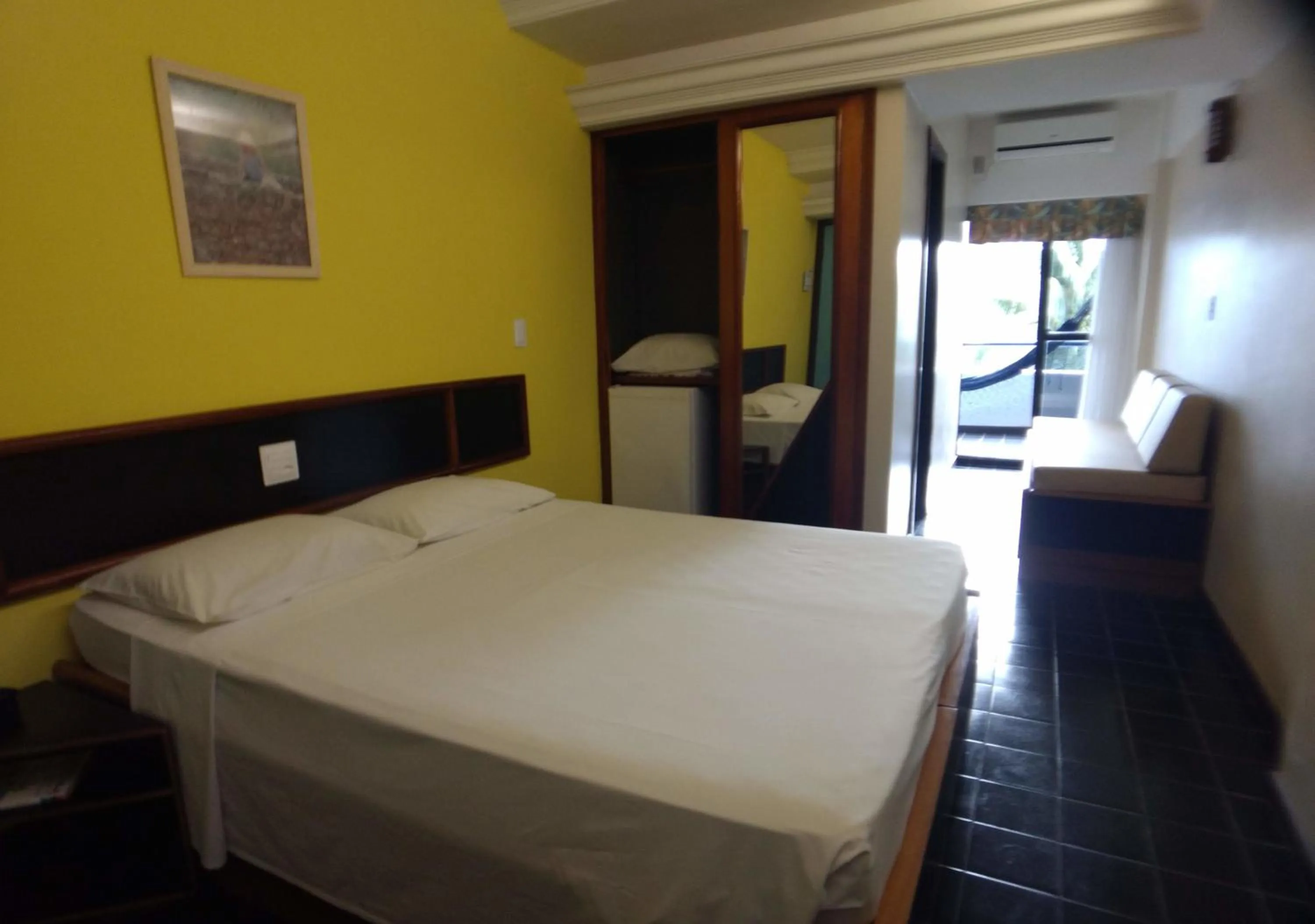 Bed in Hotel Praia da Sereia