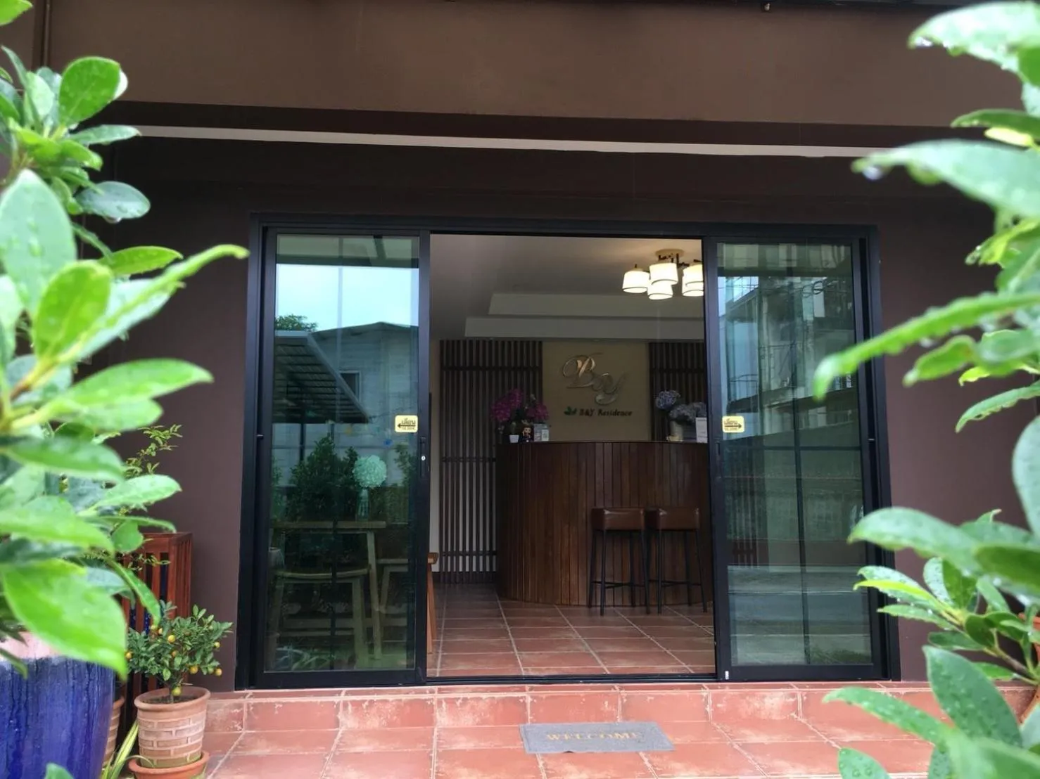 Facade/entrance in B and Y Residence