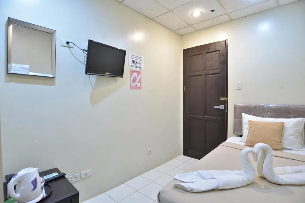 TV and multimedia, Bed in Amax Inn Makati