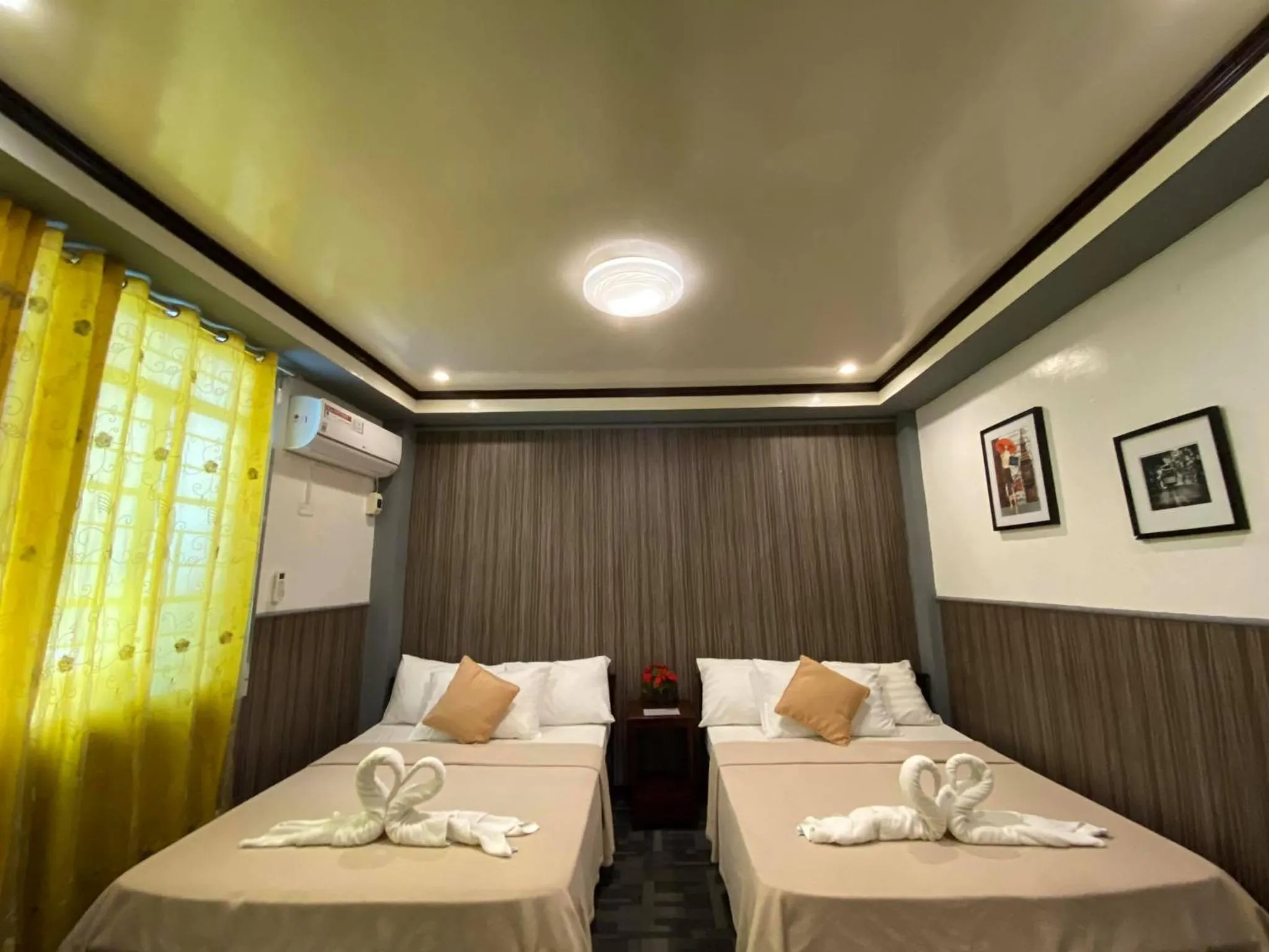 Bed in Amax Inn Makati