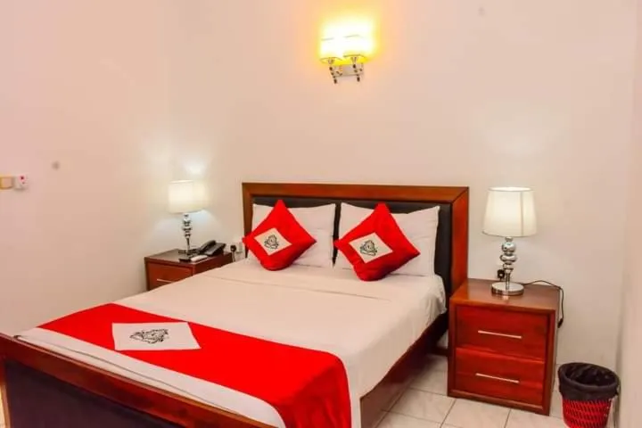 Bed in Asian Grand Hotel