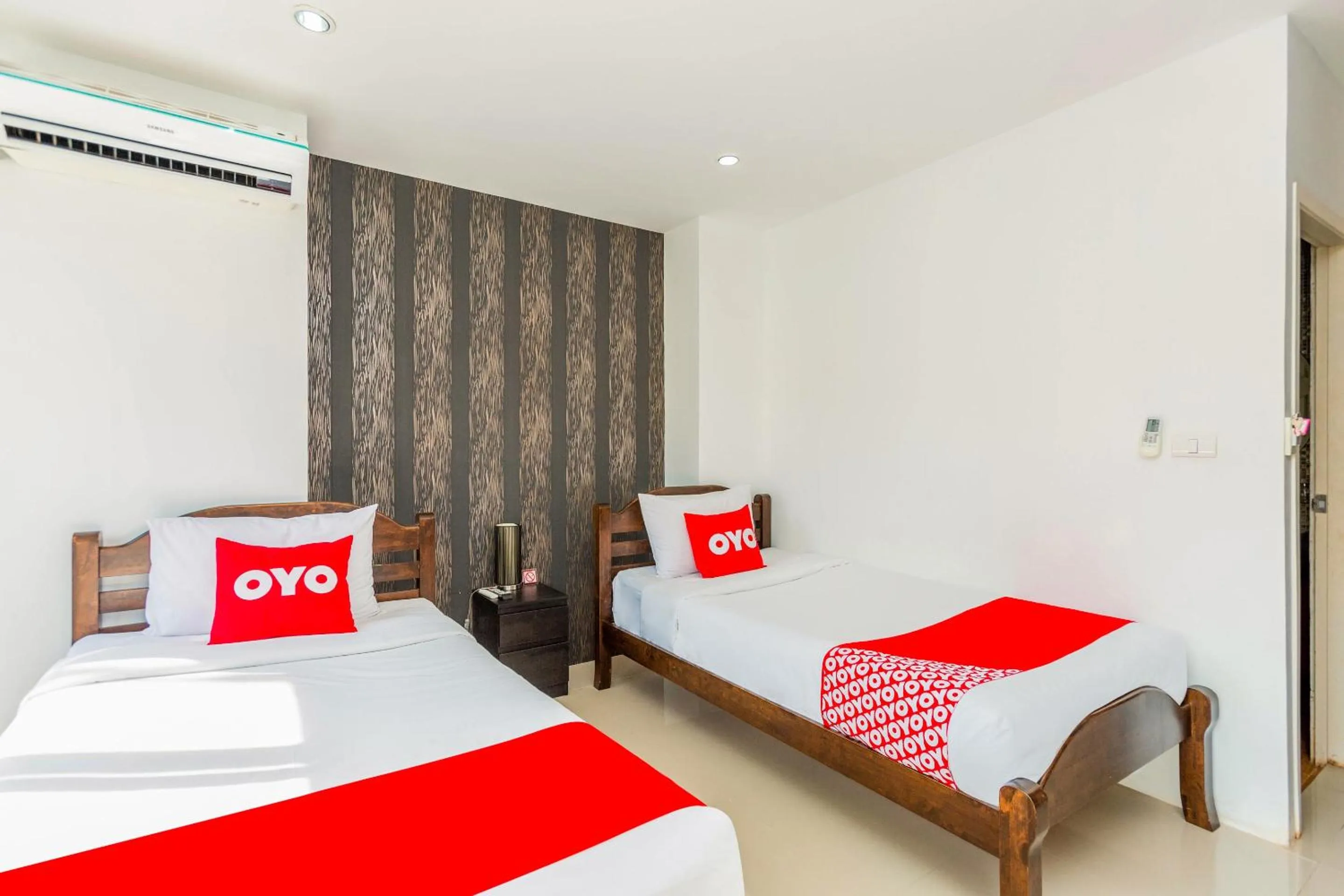 Bedroom in OYO 472 Tang Cheng Holiday Hotel