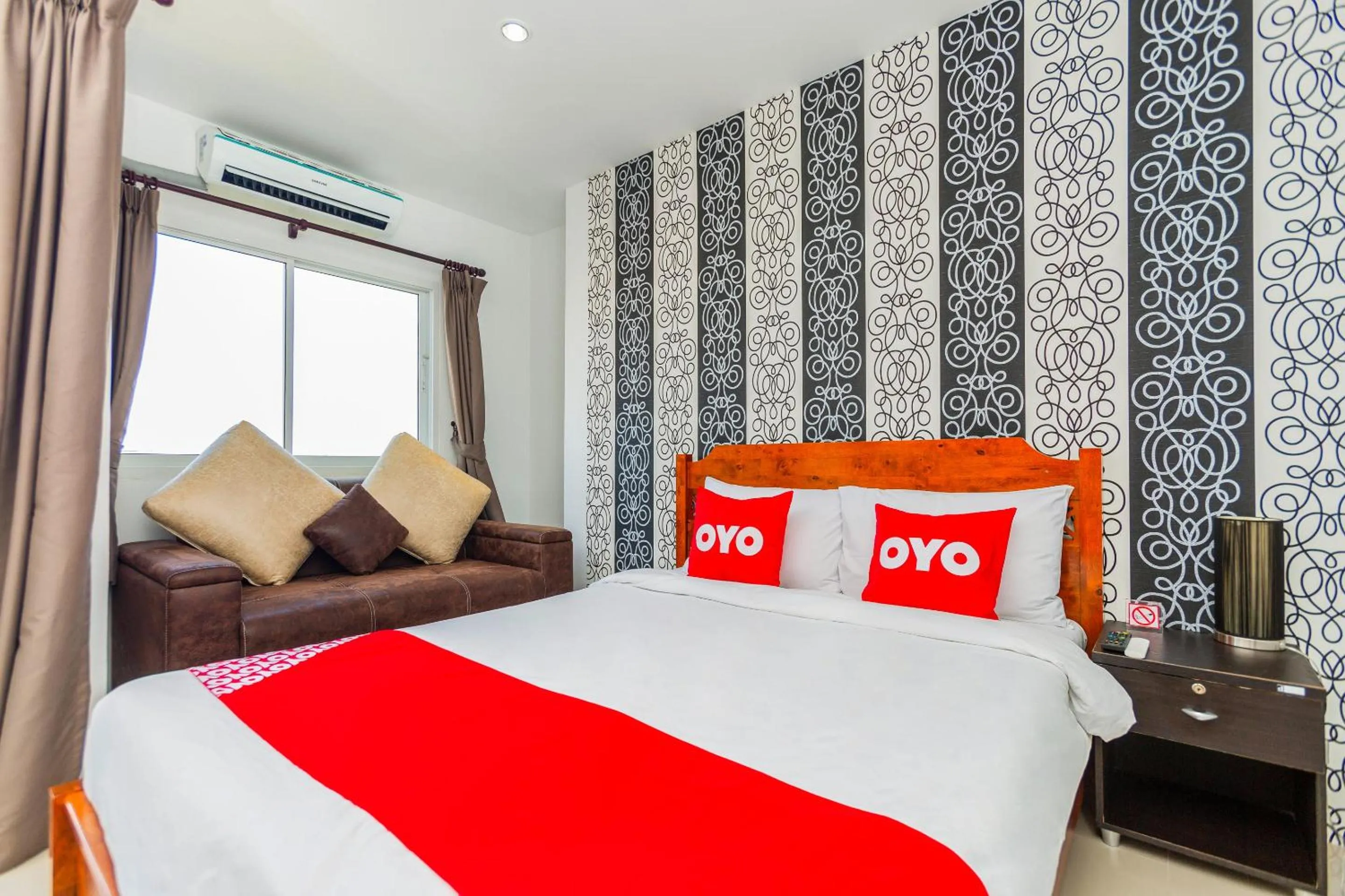 Bedroom in OYO 472 Tang Cheng Holiday Hotel