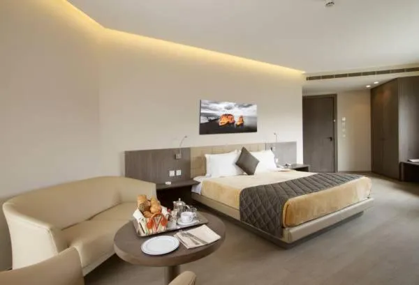 Bed in Promenade Hotel