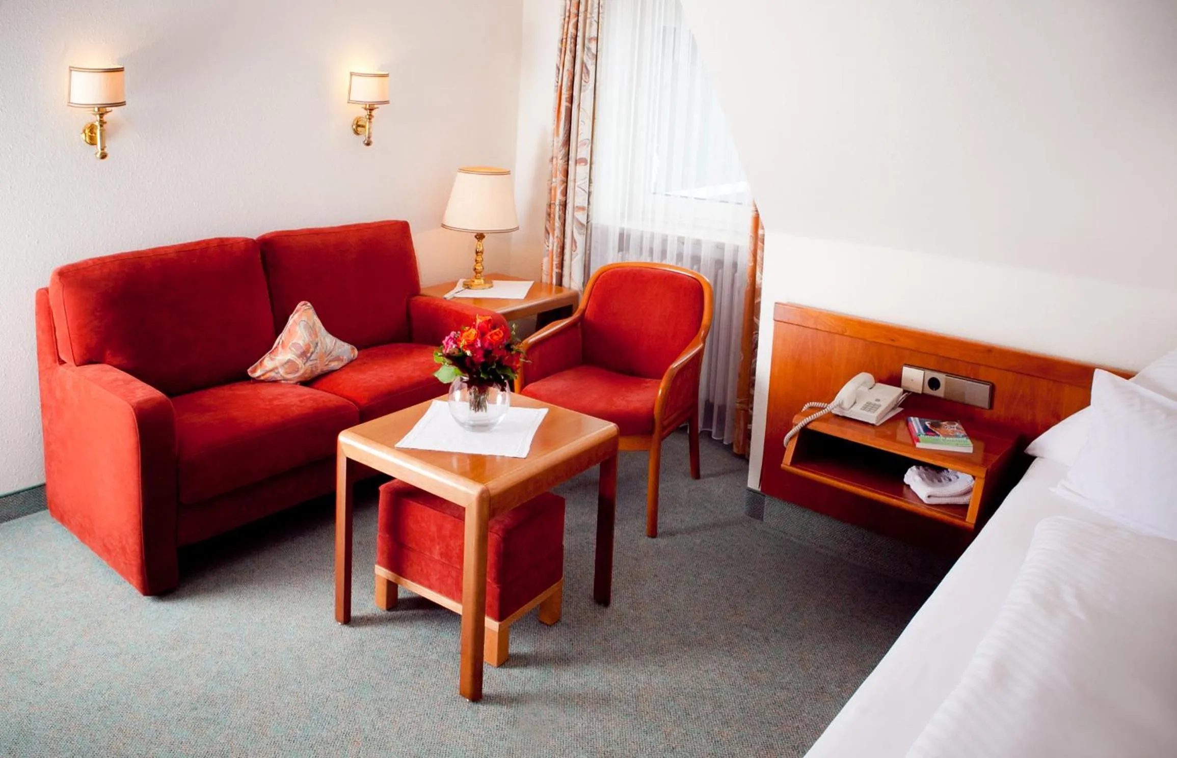 Seating area, Bed in Kurhotel Roswitha