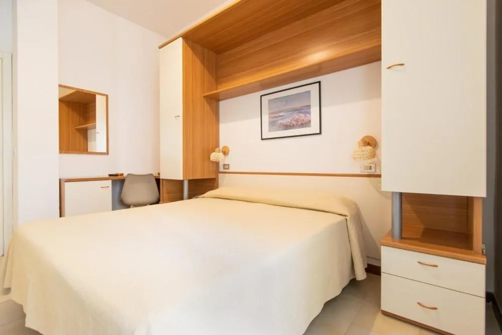 Bed in Hotel Cavalluccio Marino