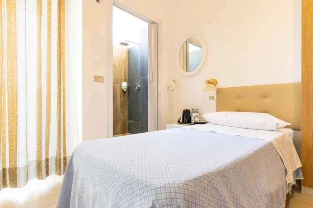 Bedroom in Hotel Cavalluccio Marino