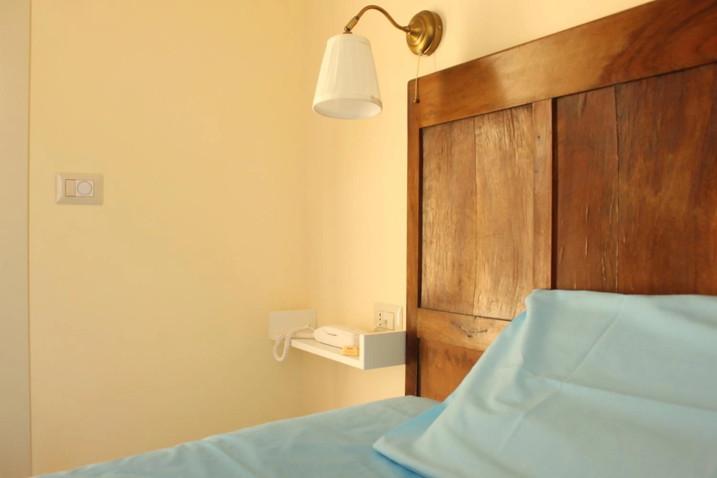 Bed in B&B Il Falco e l'Ulivo