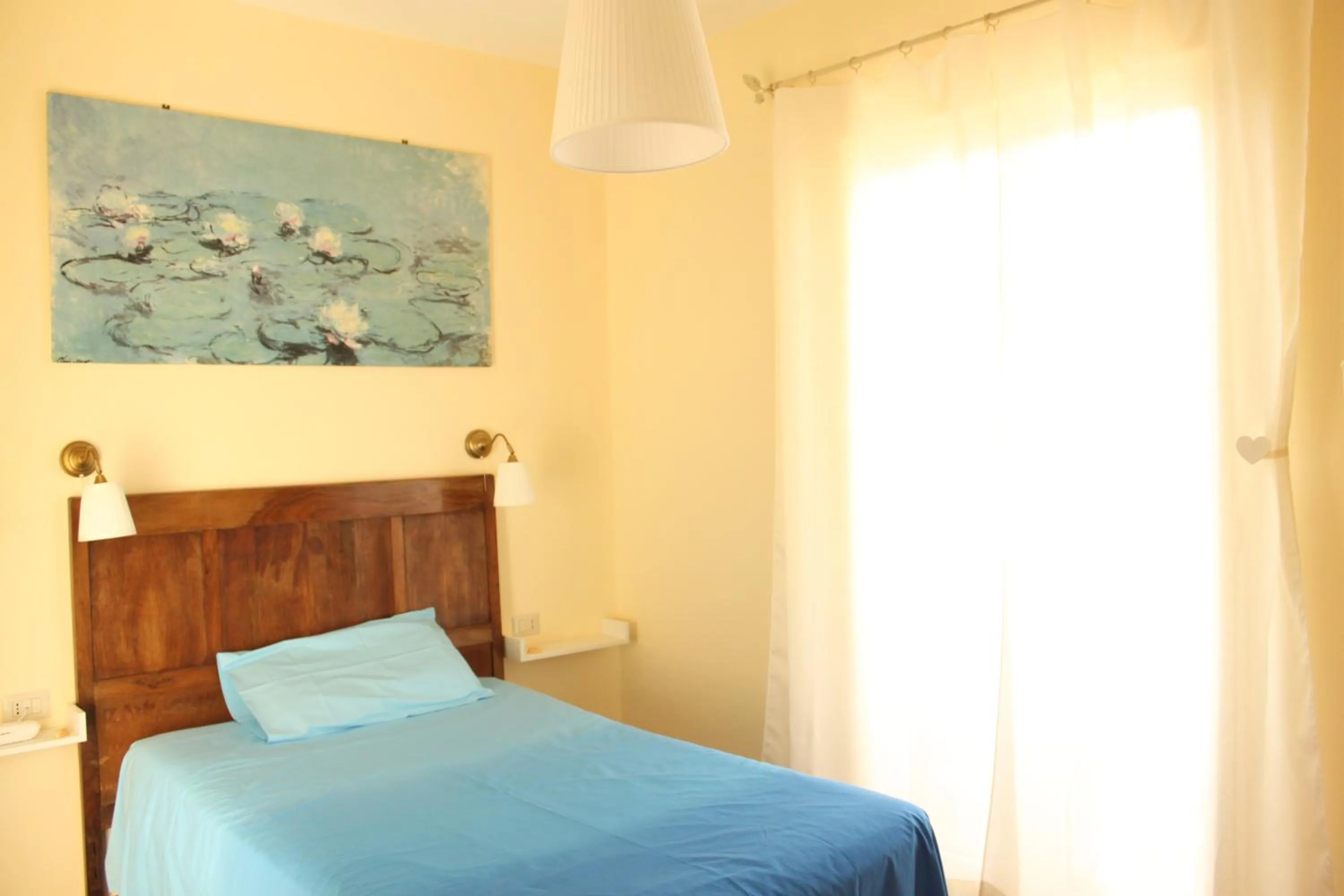 Bed in B&B Il Falco e l'Ulivo