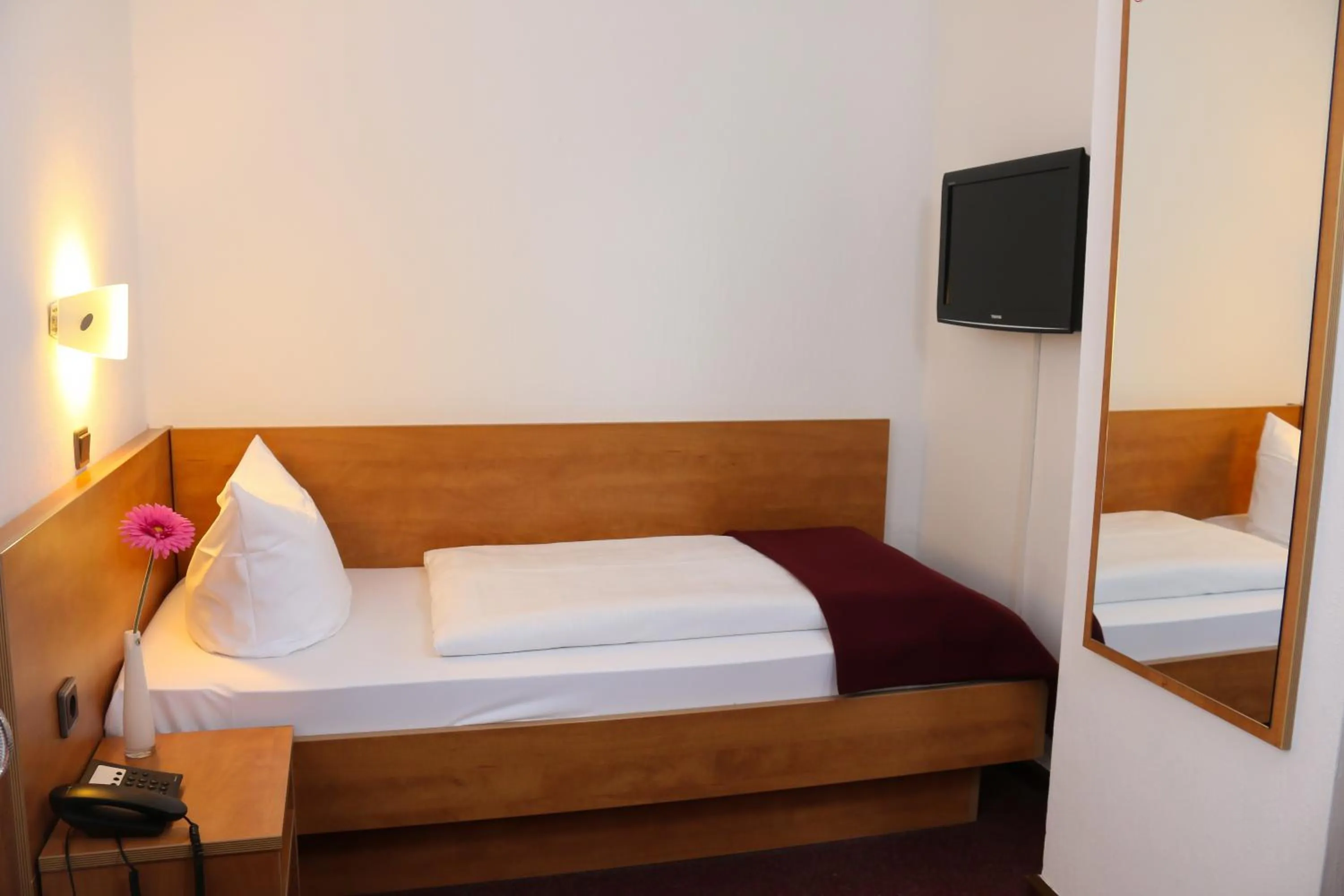 Bed in City Hotel Journal