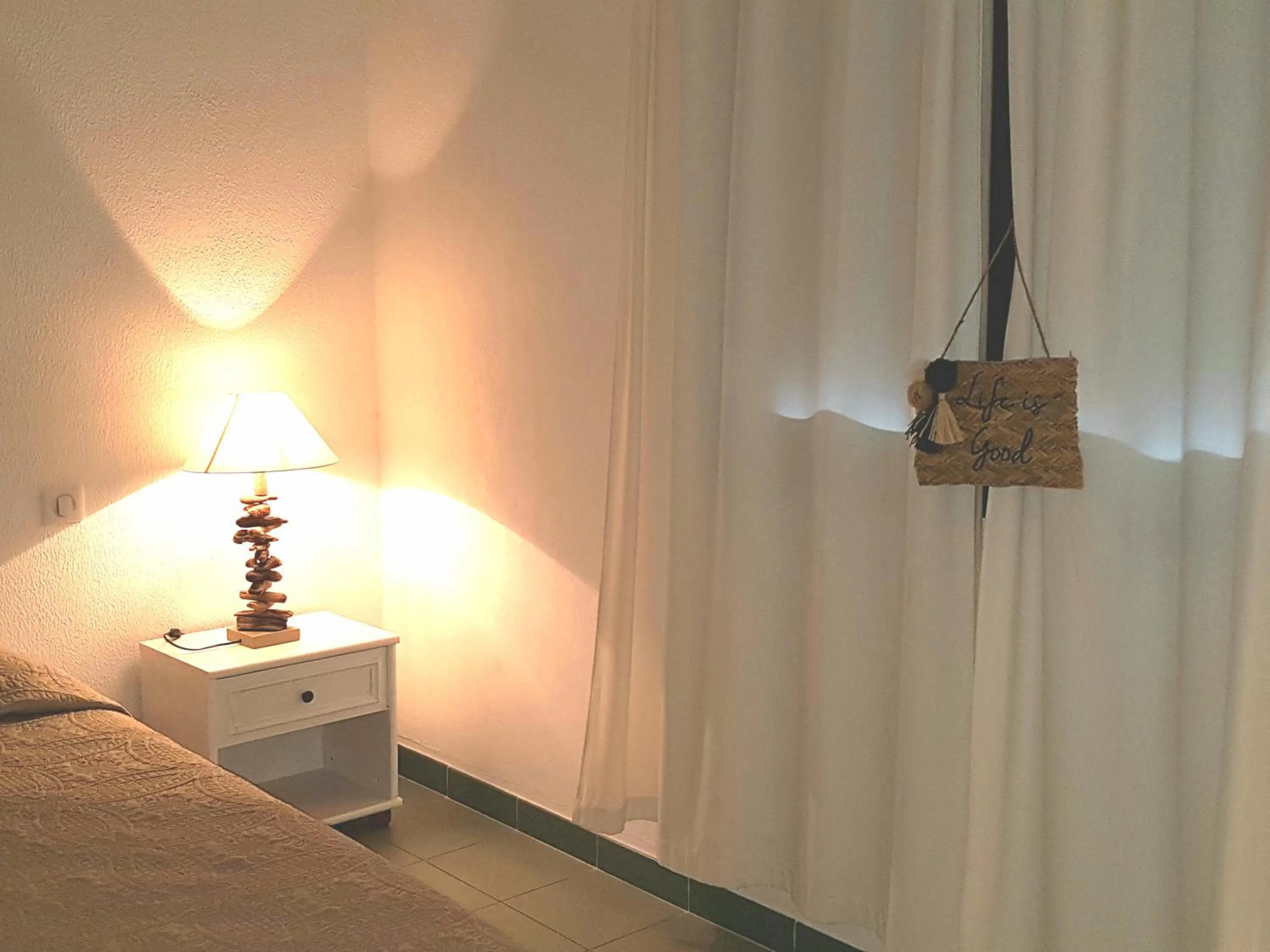 Bed in Résidence Costa d'Oru