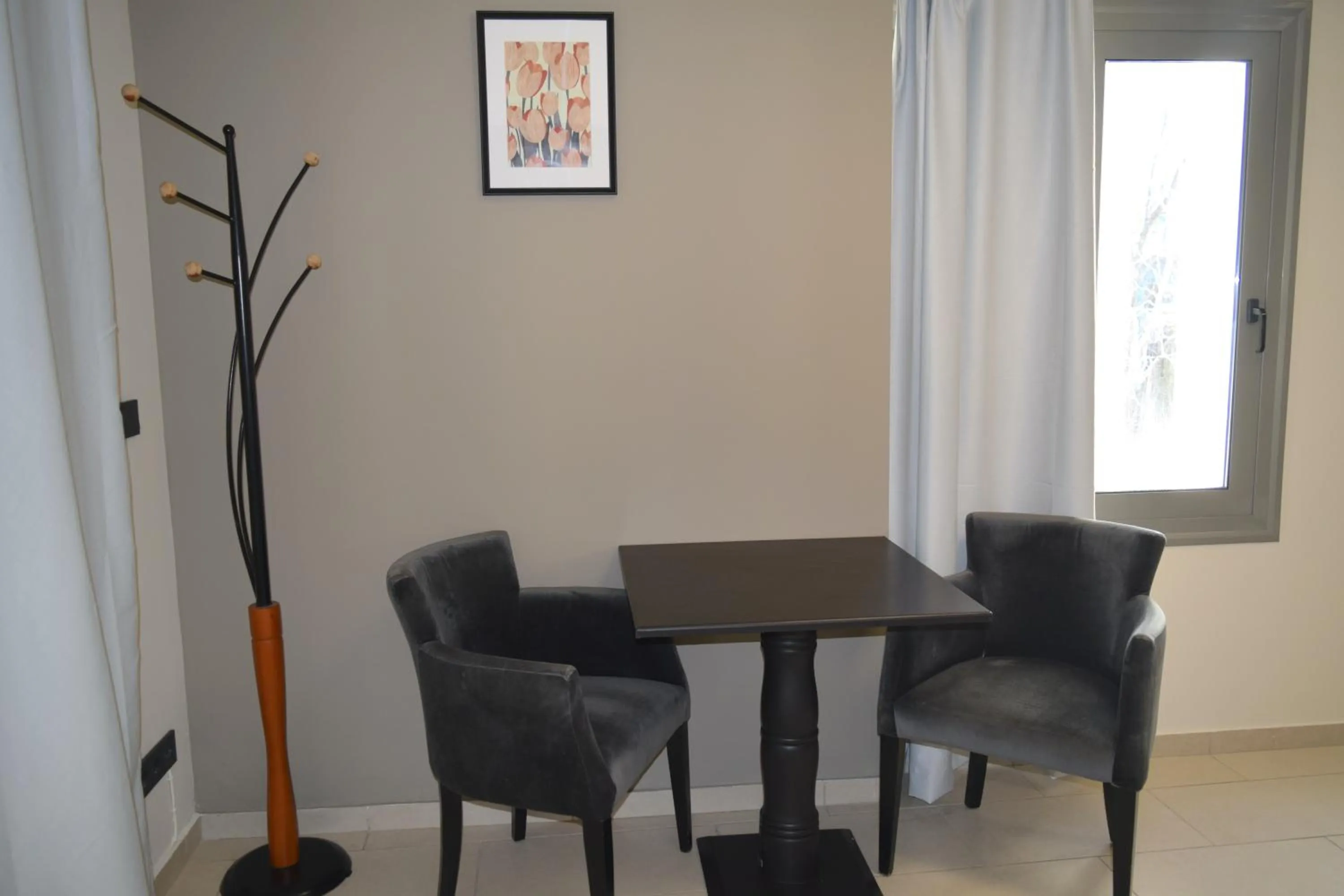Seating area in Athenian Central Apartments
