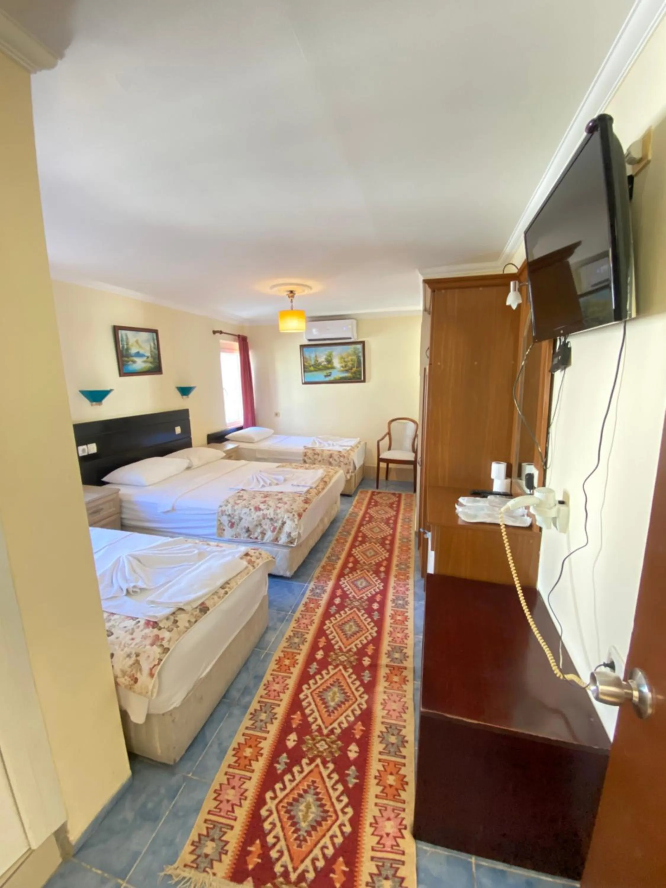 Bed in Sevin Hotel Pension