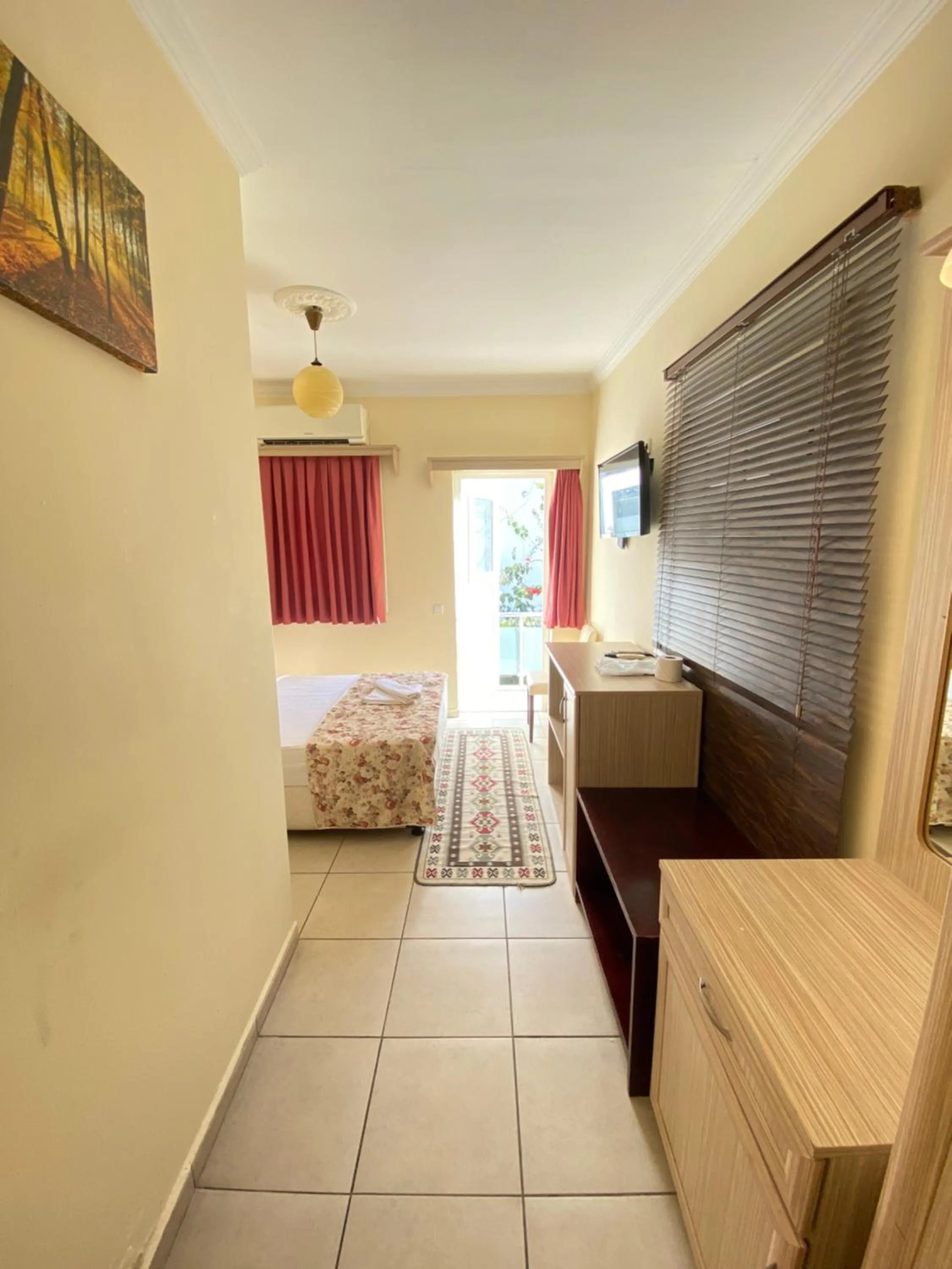 Bed in Sevin Hotel Pension