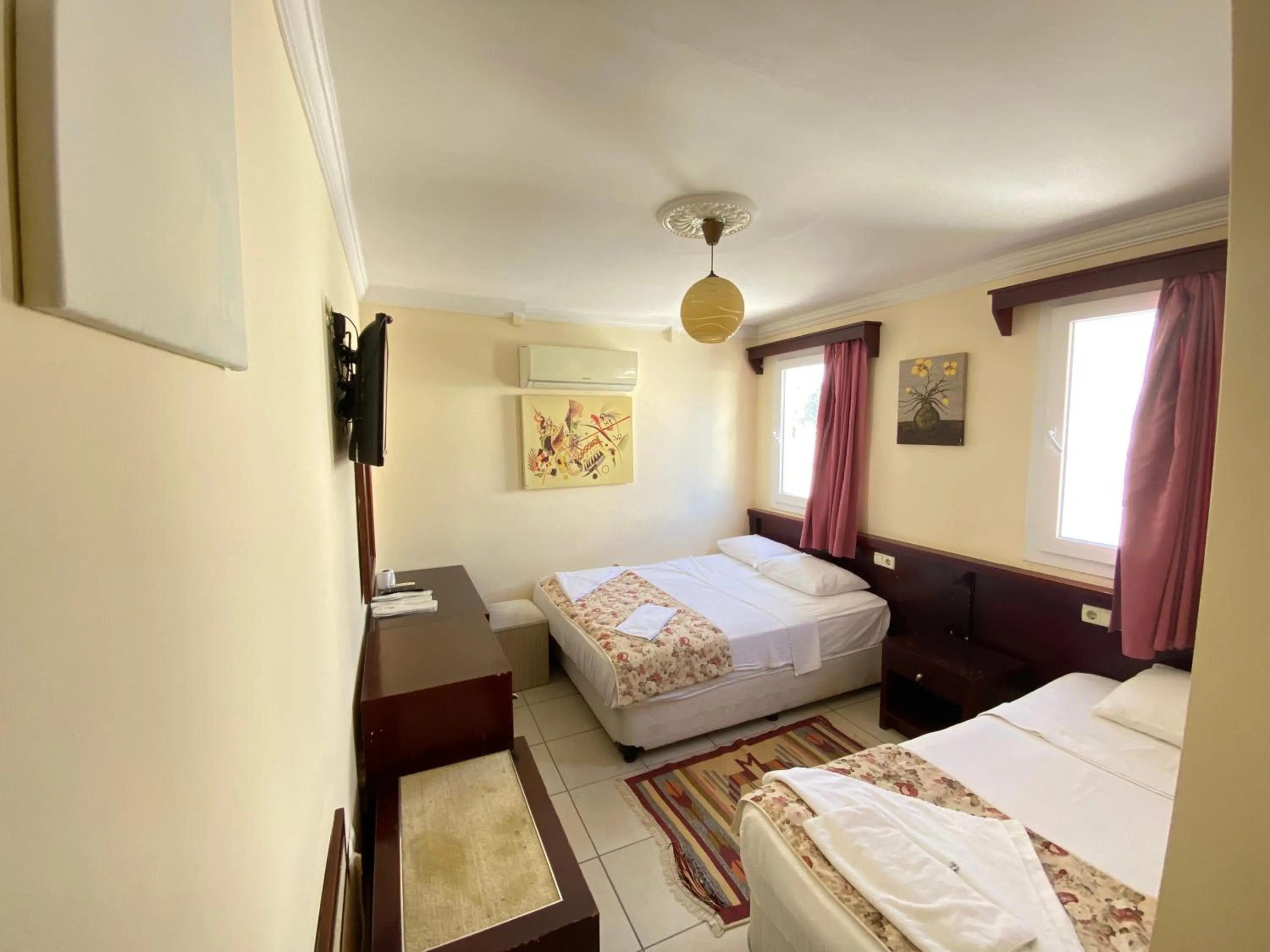 Bed in Sevin Hotel Pension