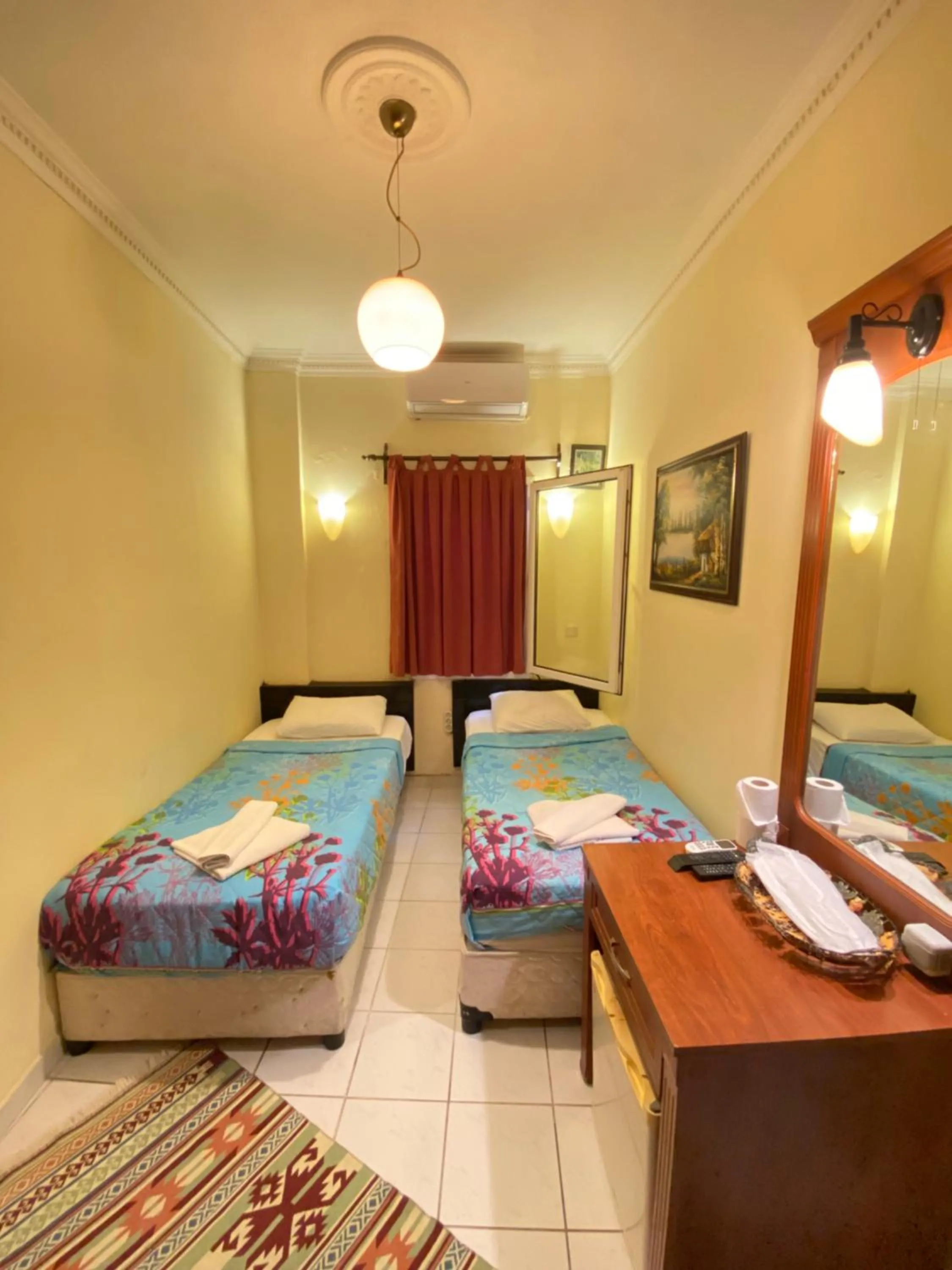 Bed in Sevin Hotel Pension