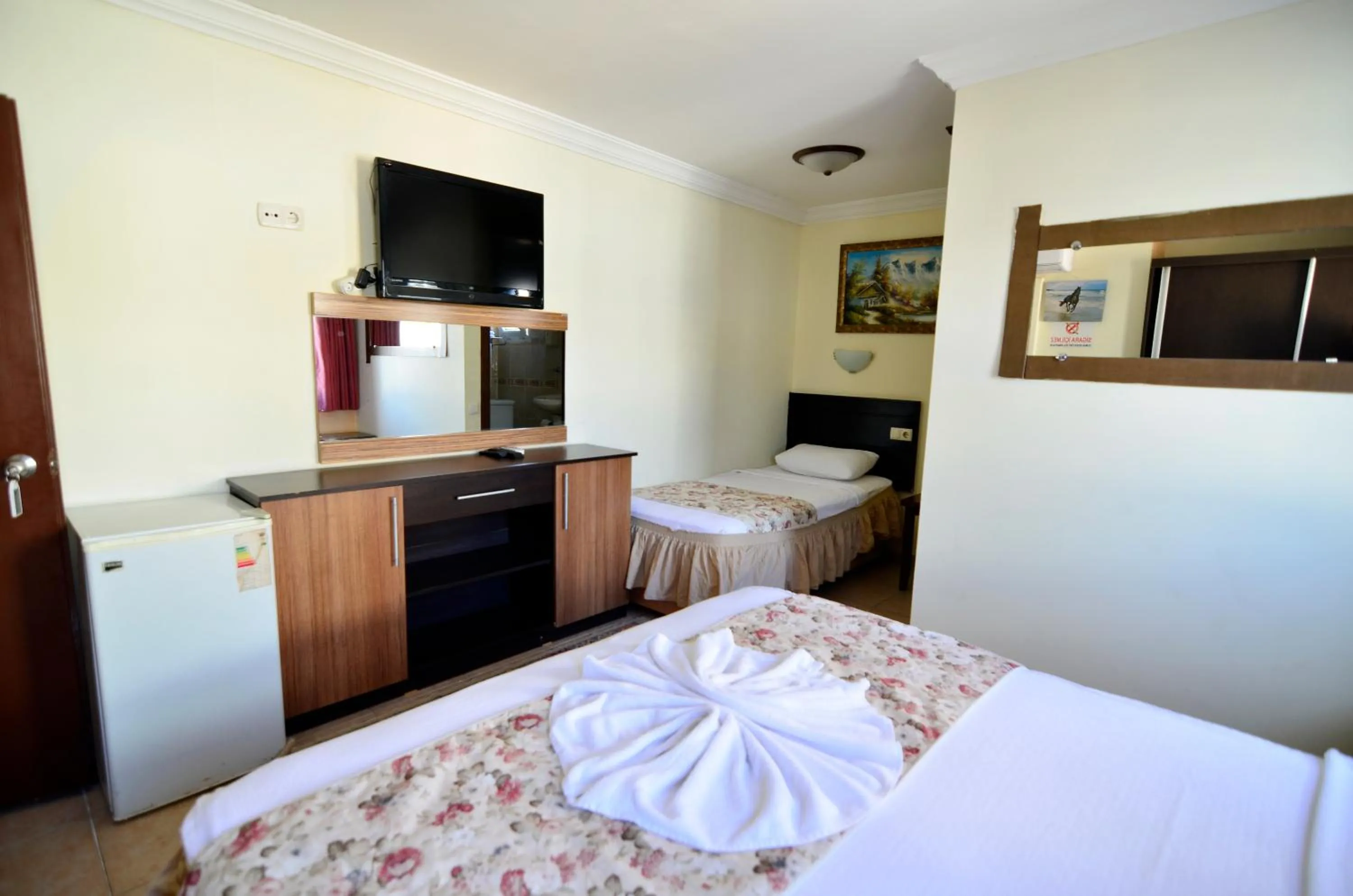 Bed in Sevin Hotel Pension