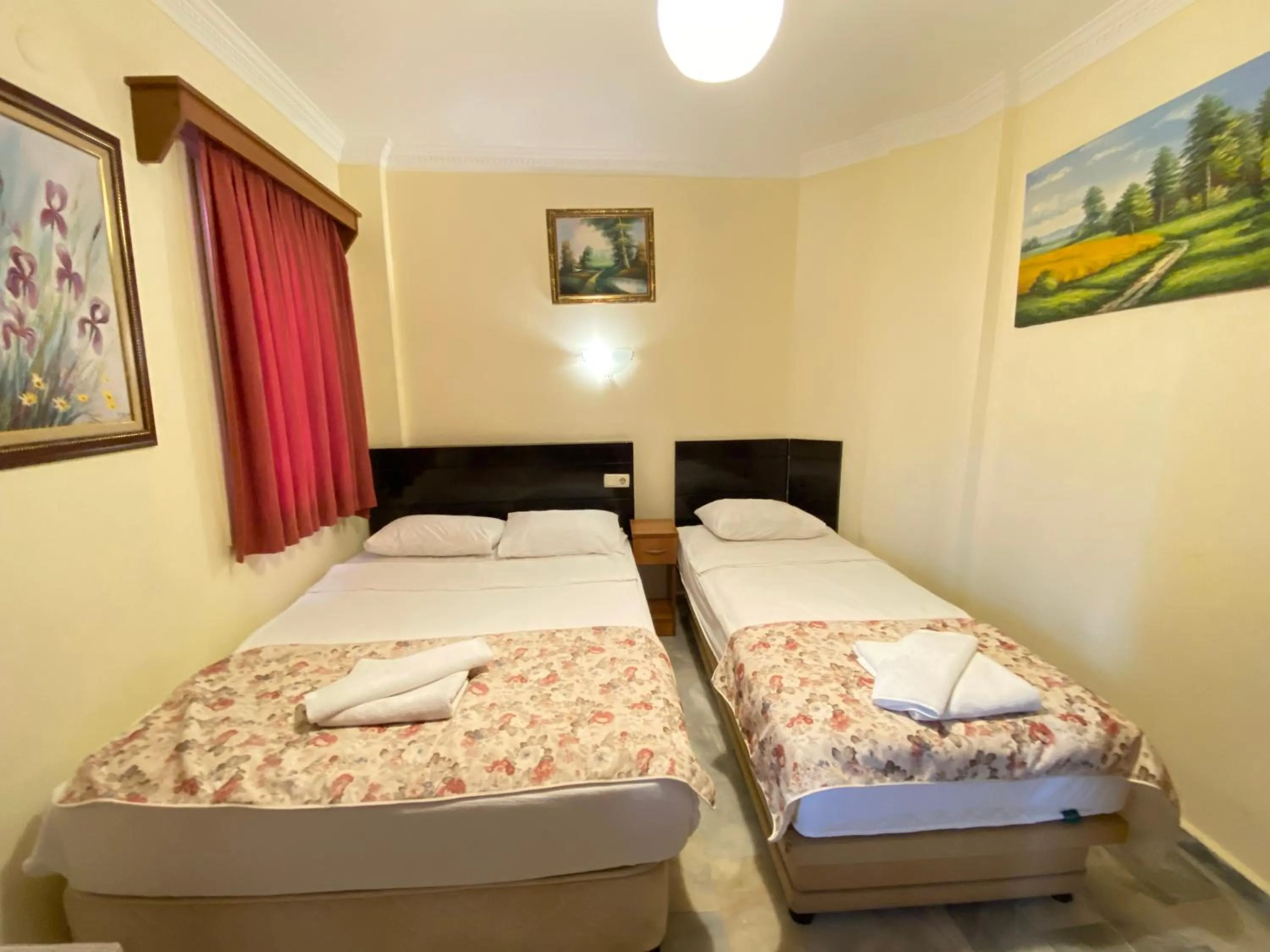 Bed in Sevin Hotel Pension