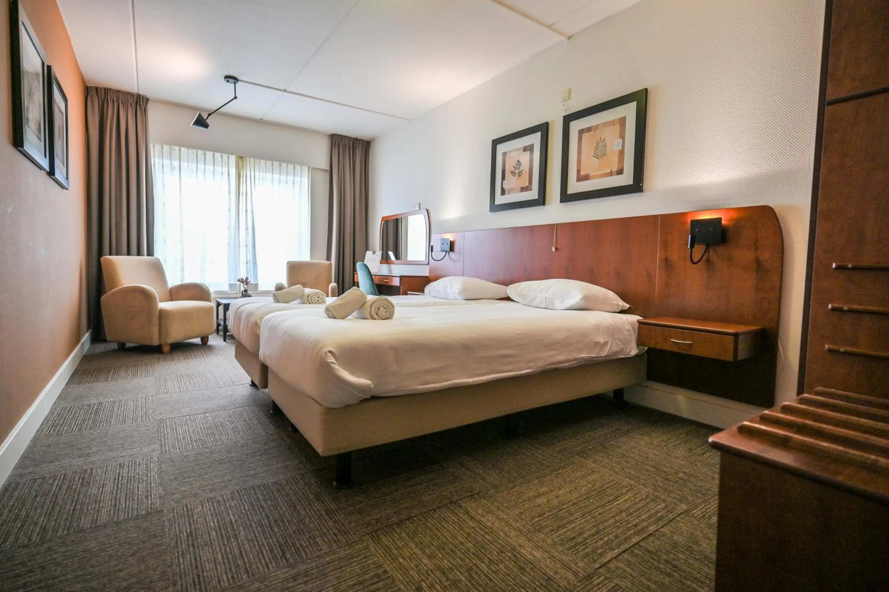 Bed in De Stobbe hotel & suites