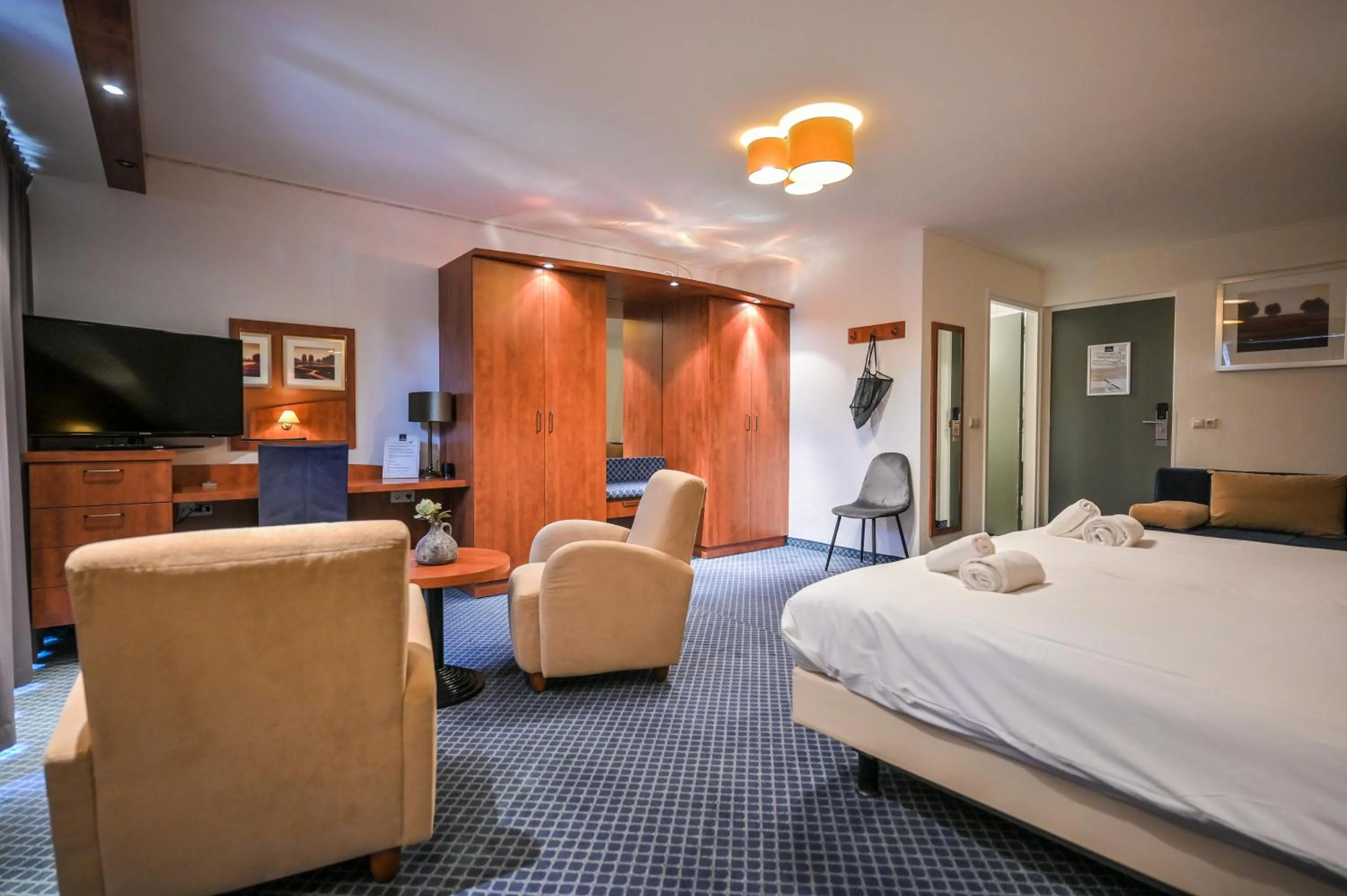 Bed in De Stobbe hotel & suites