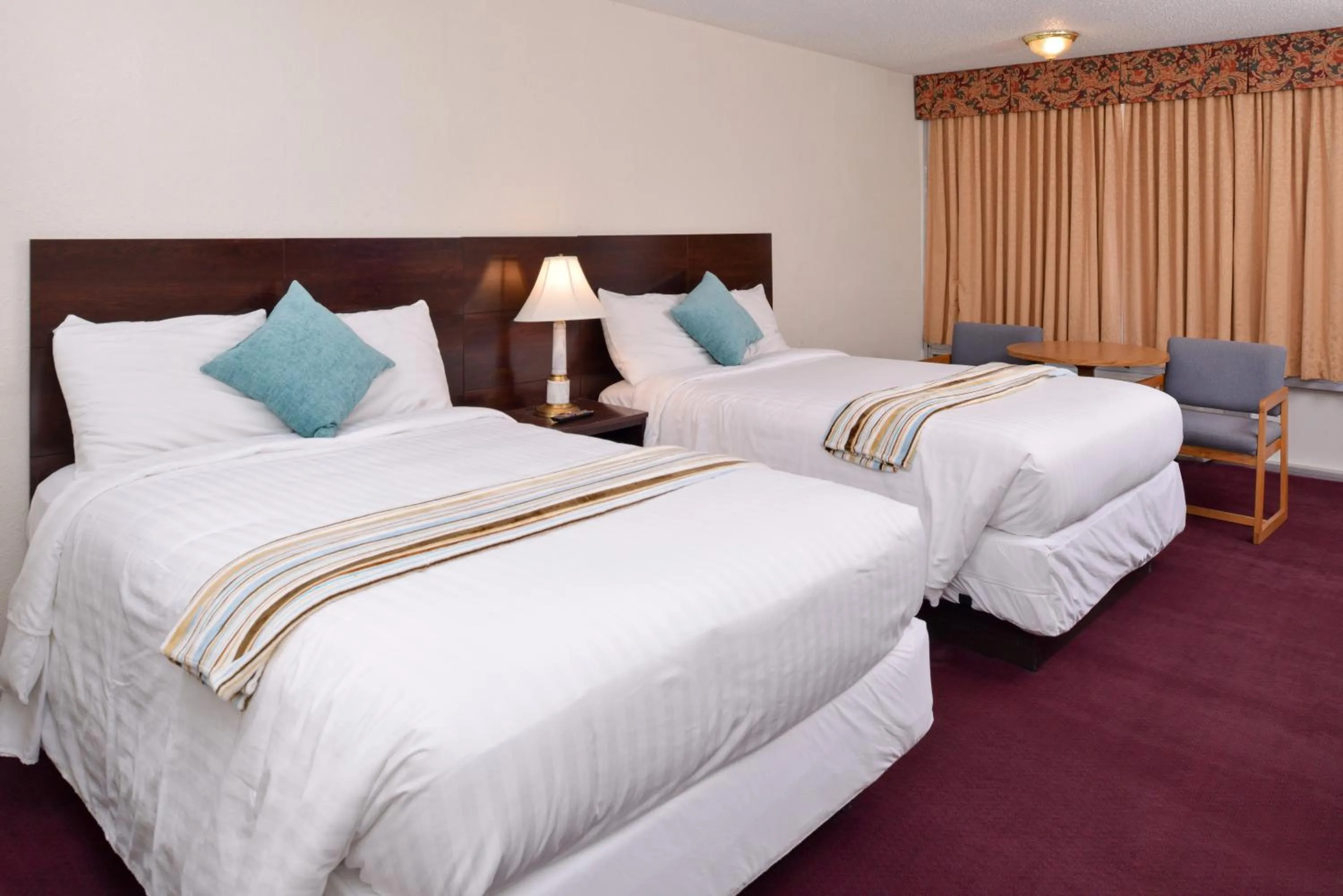 Bedroom in Red Carpet Inn Battleboro