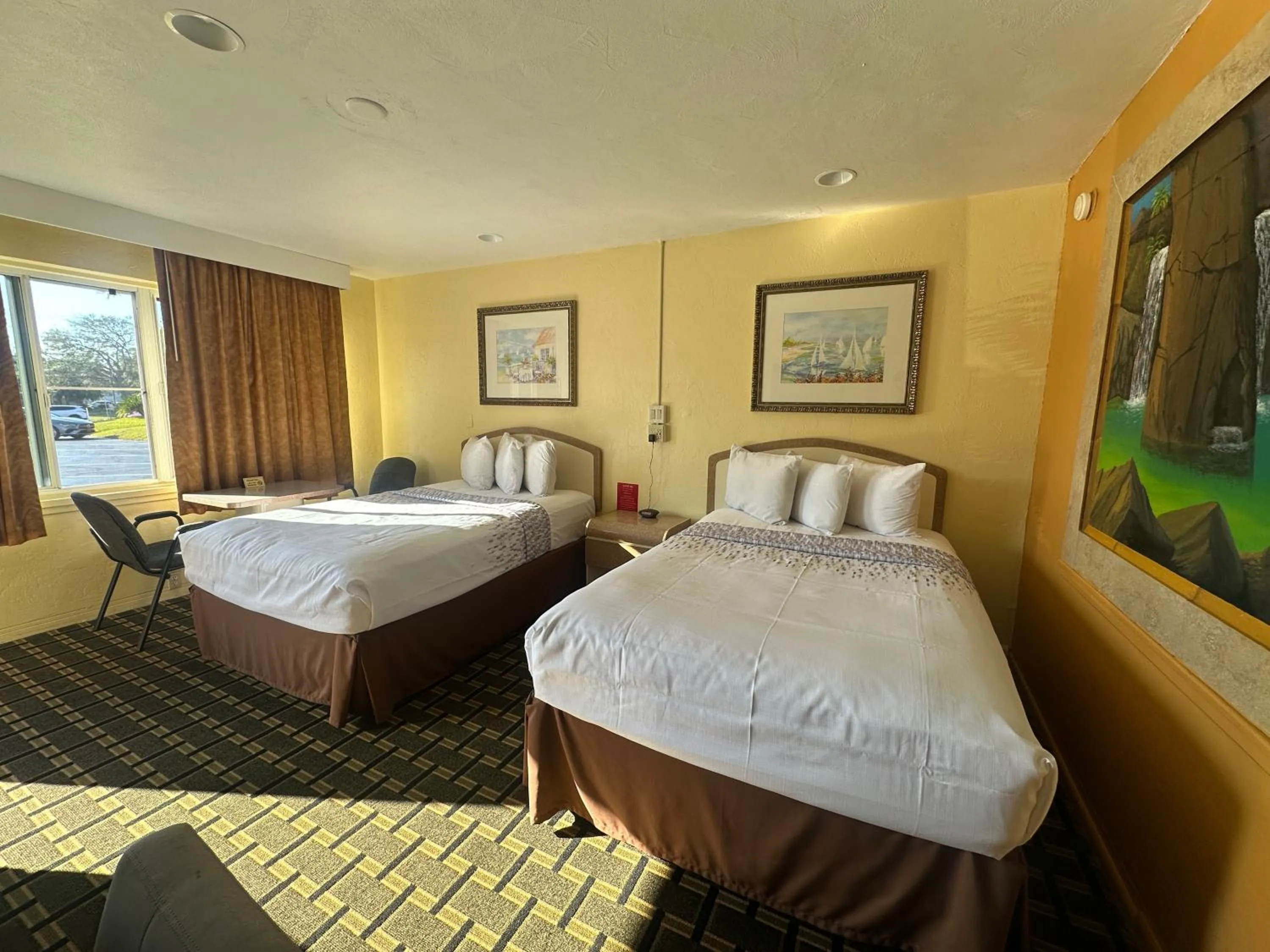 Bedroom, Bed in Super Inn By Oyo Daytona Beach Near Airport