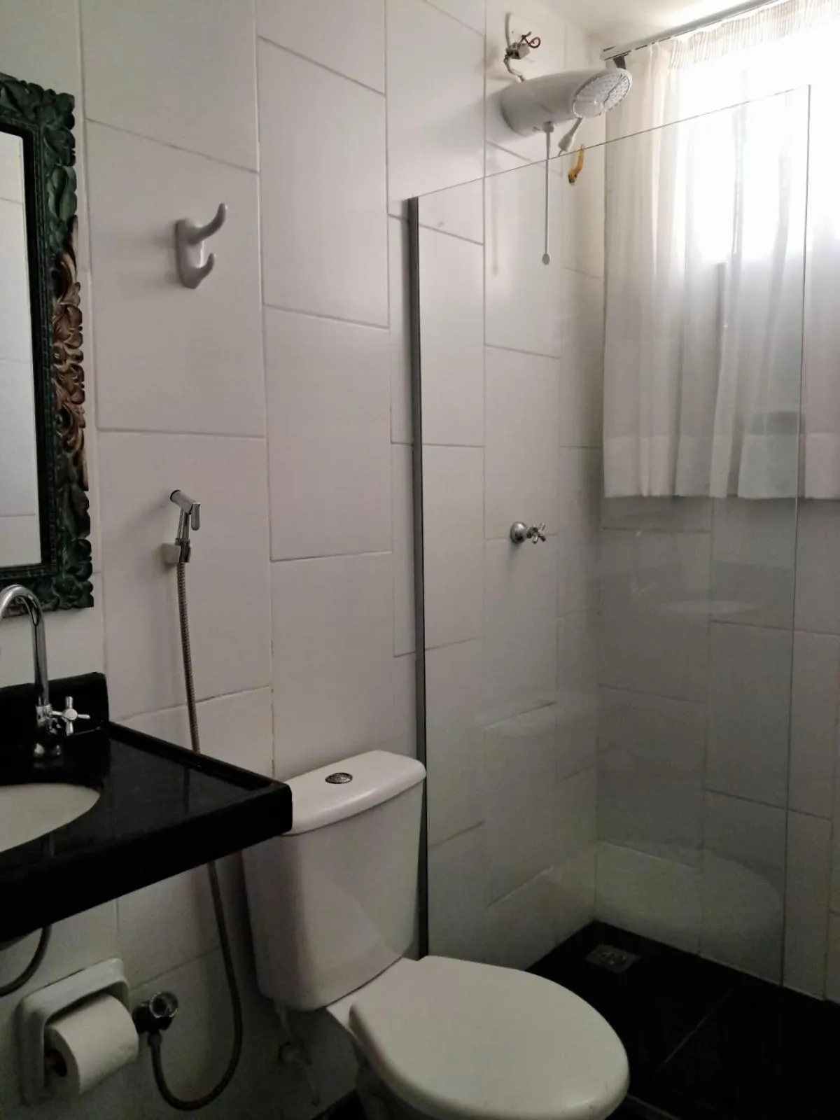 Shower in Hotel Pousada Acácia da Barra