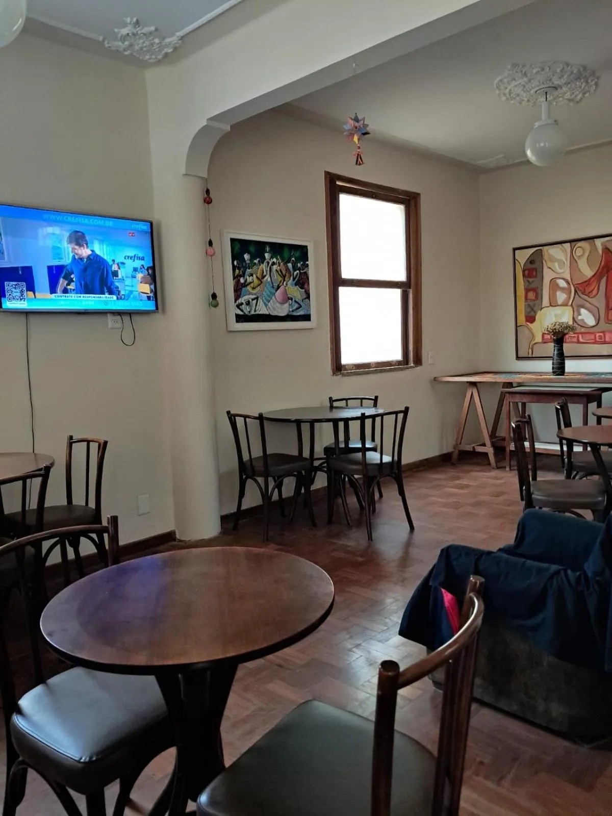 Communal lounge/ TV room in Hotel Pousada Acácia da Barra