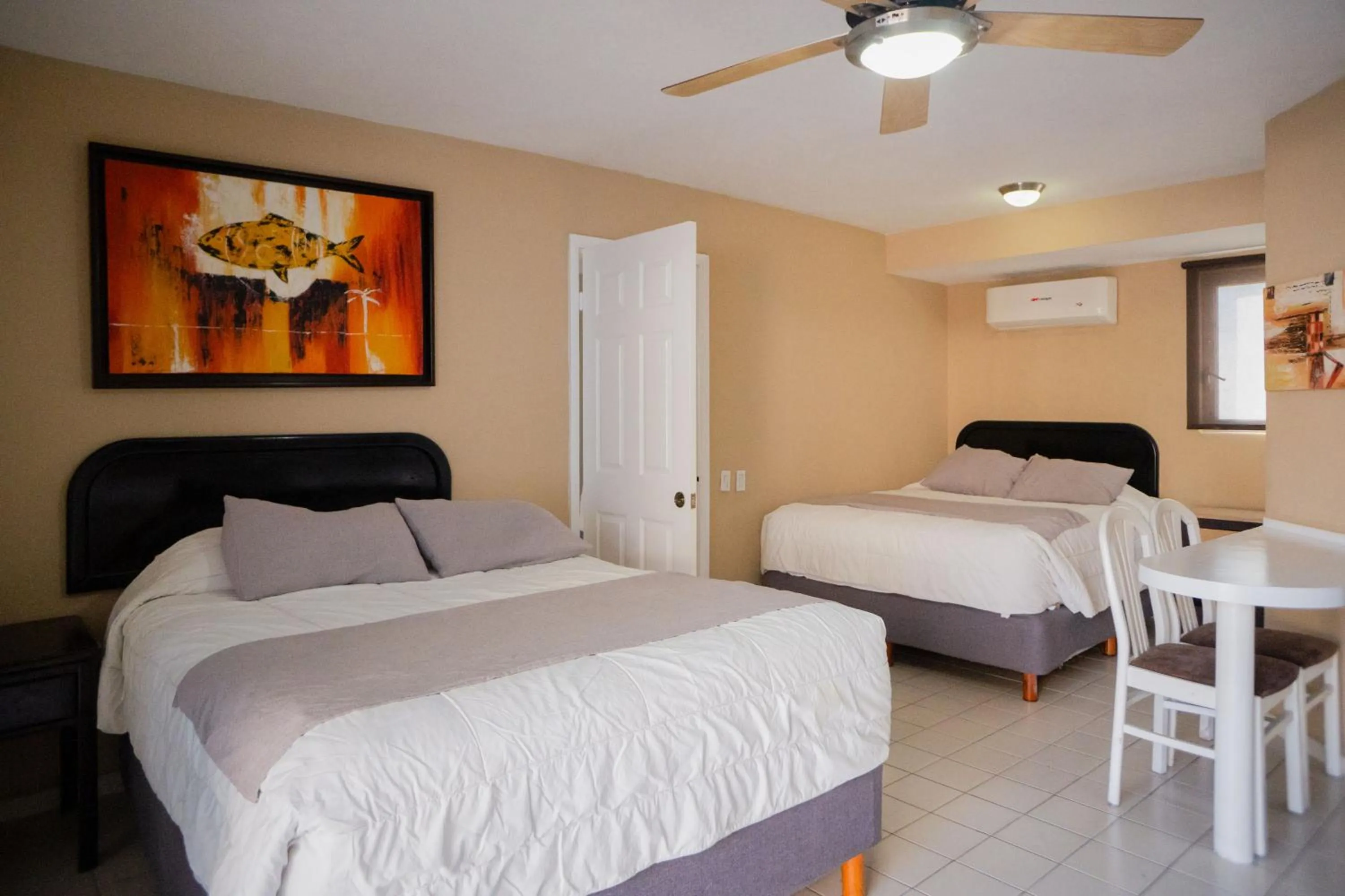 Bed in Hotel Santa Fe Los Cabos by Villa Group