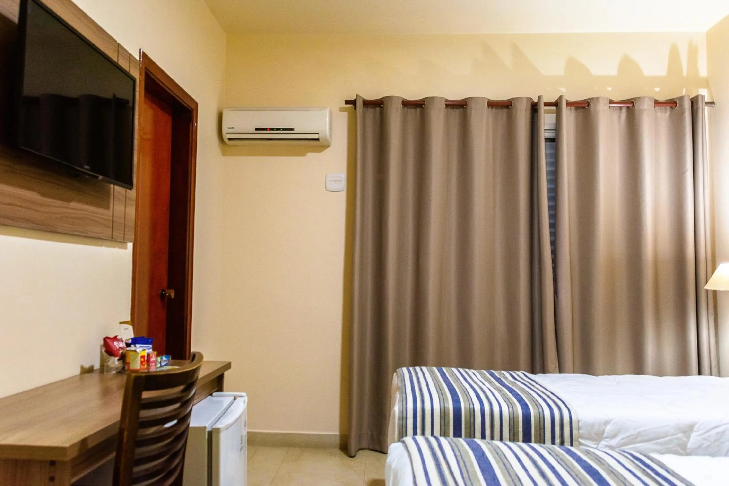 Bedroom, Bed in Fenix Hotel Pouso Alegre