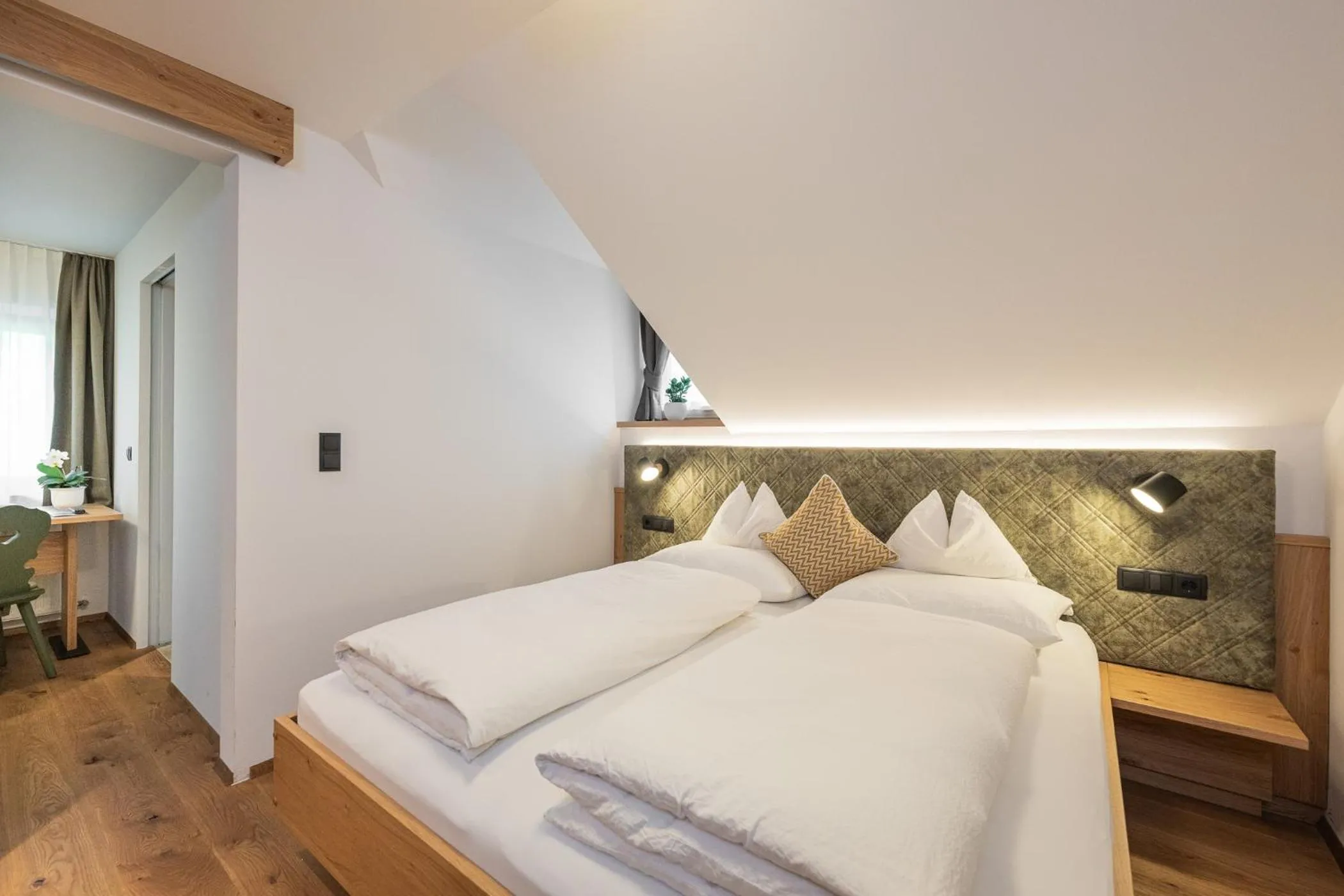 Bed in Gasthof Albergo Dolomiten