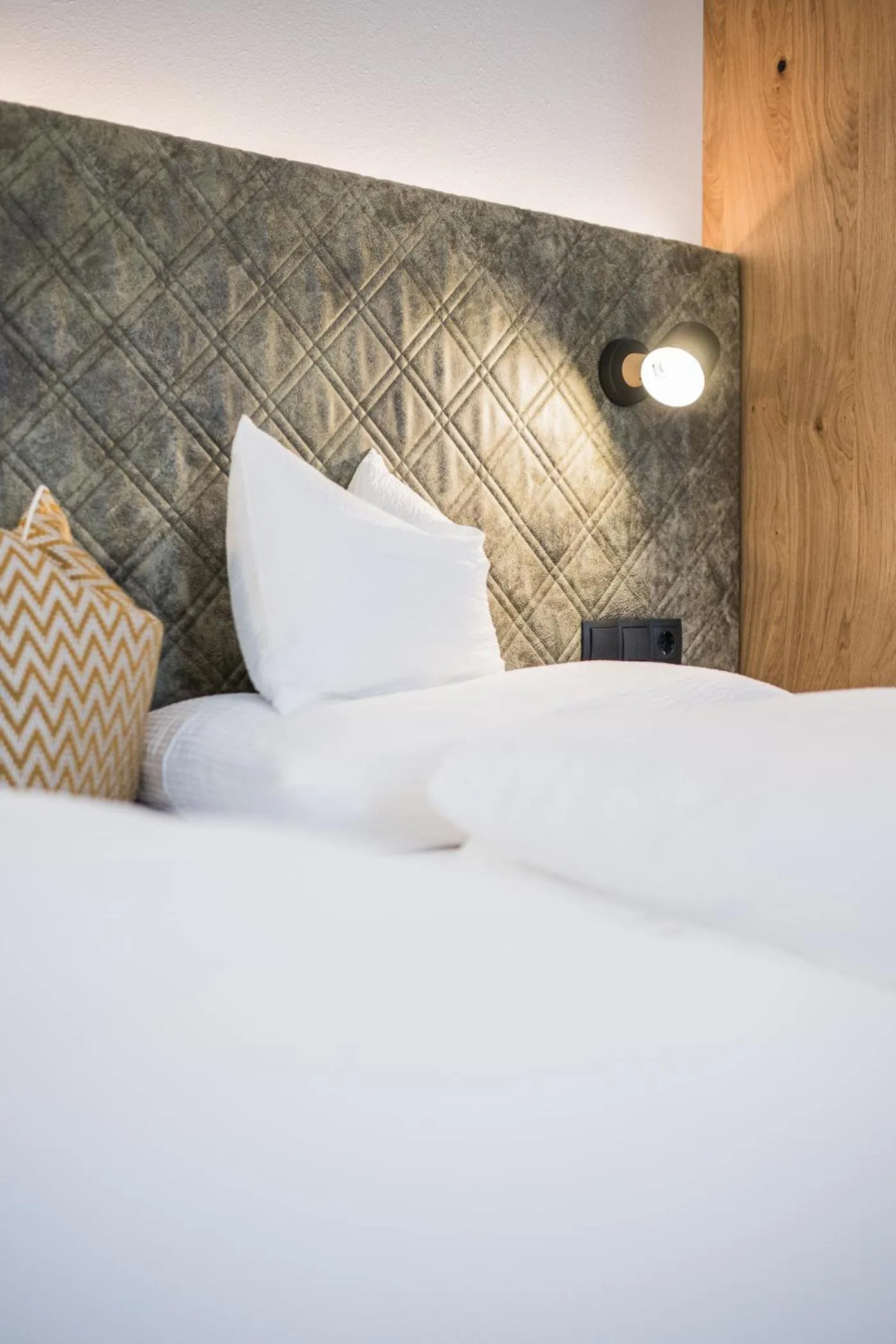 Bed in Gasthof Albergo Dolomiten