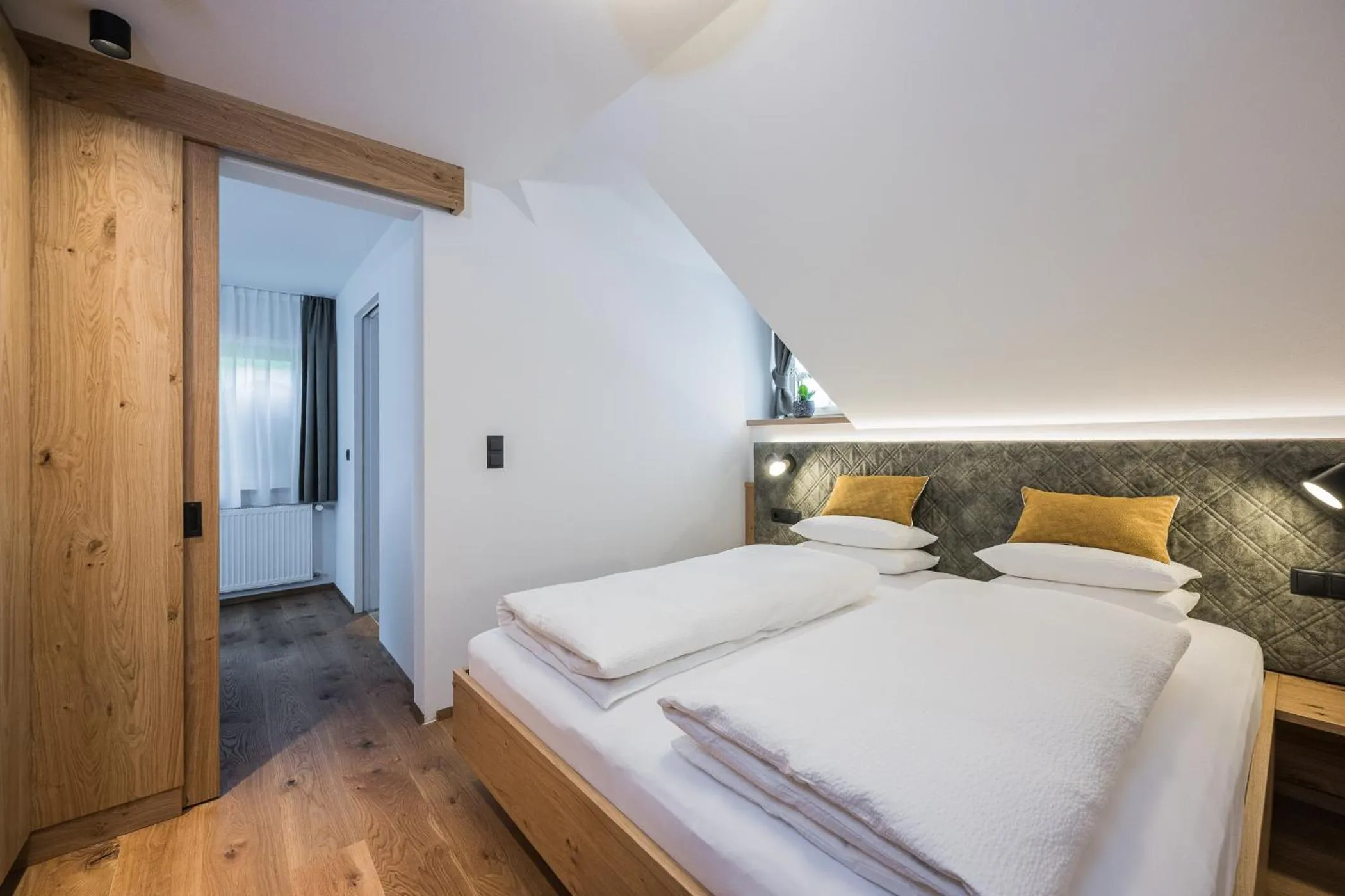 Bed in Gasthof Albergo Dolomiten