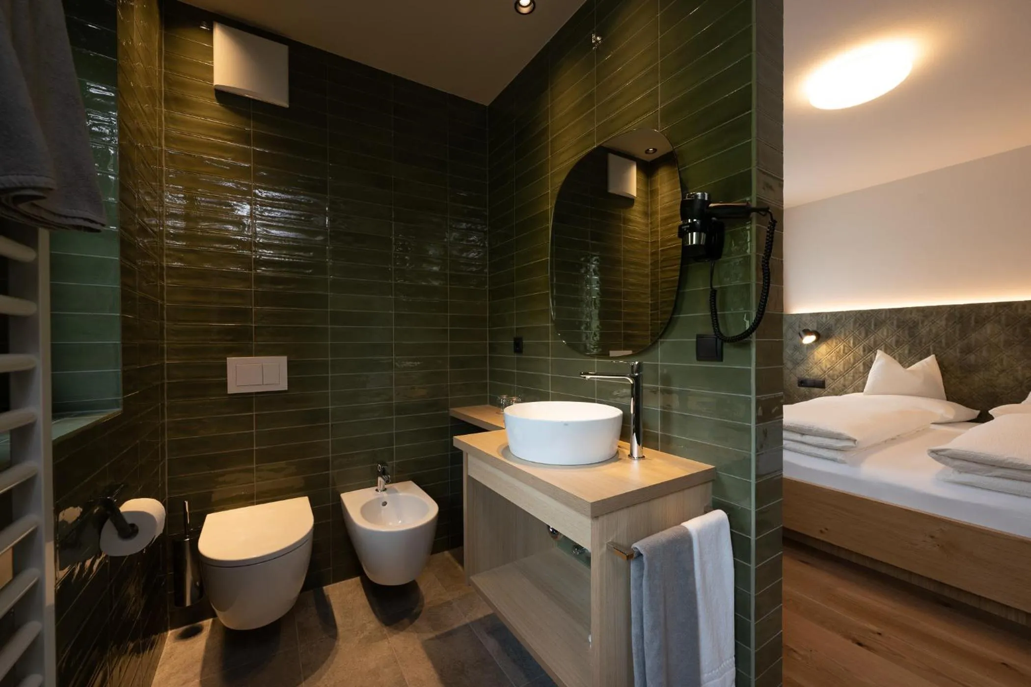 Bed in Gasthof Albergo Dolomiten
