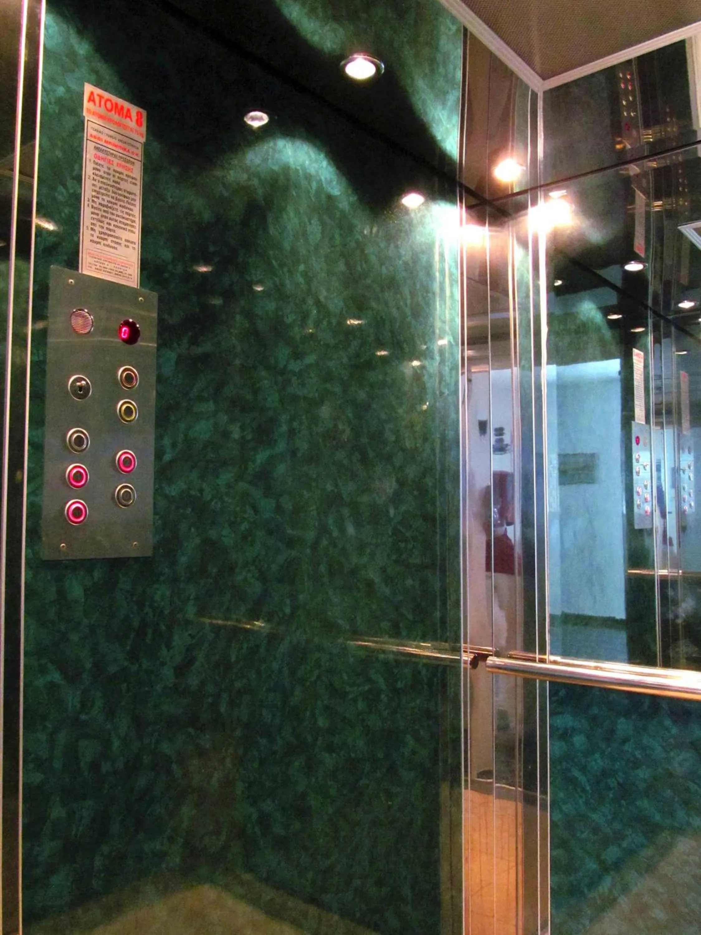 Communal lounge/ TV room in Pagona Hotel