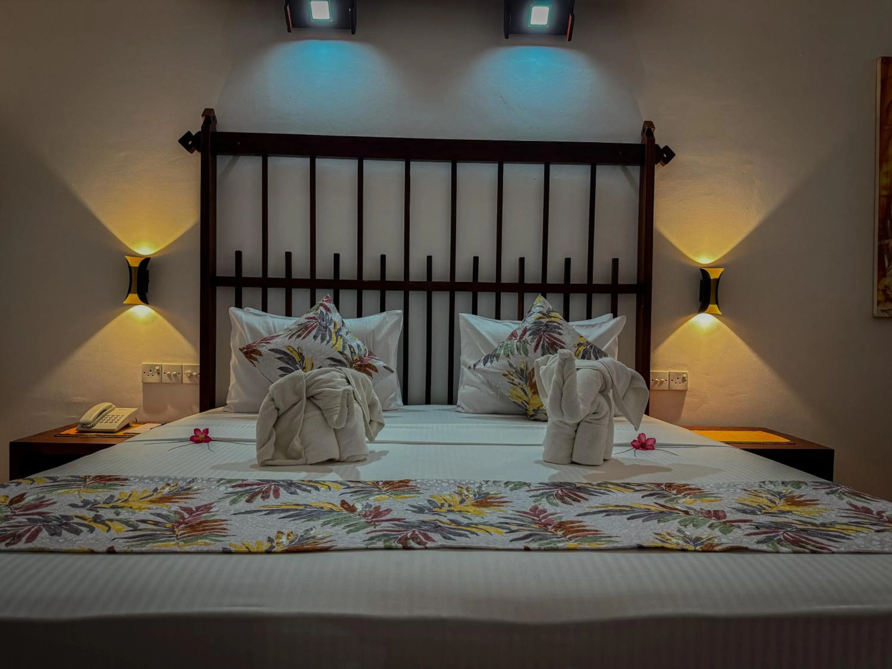 Bed in The Long Beach Resort & Spa