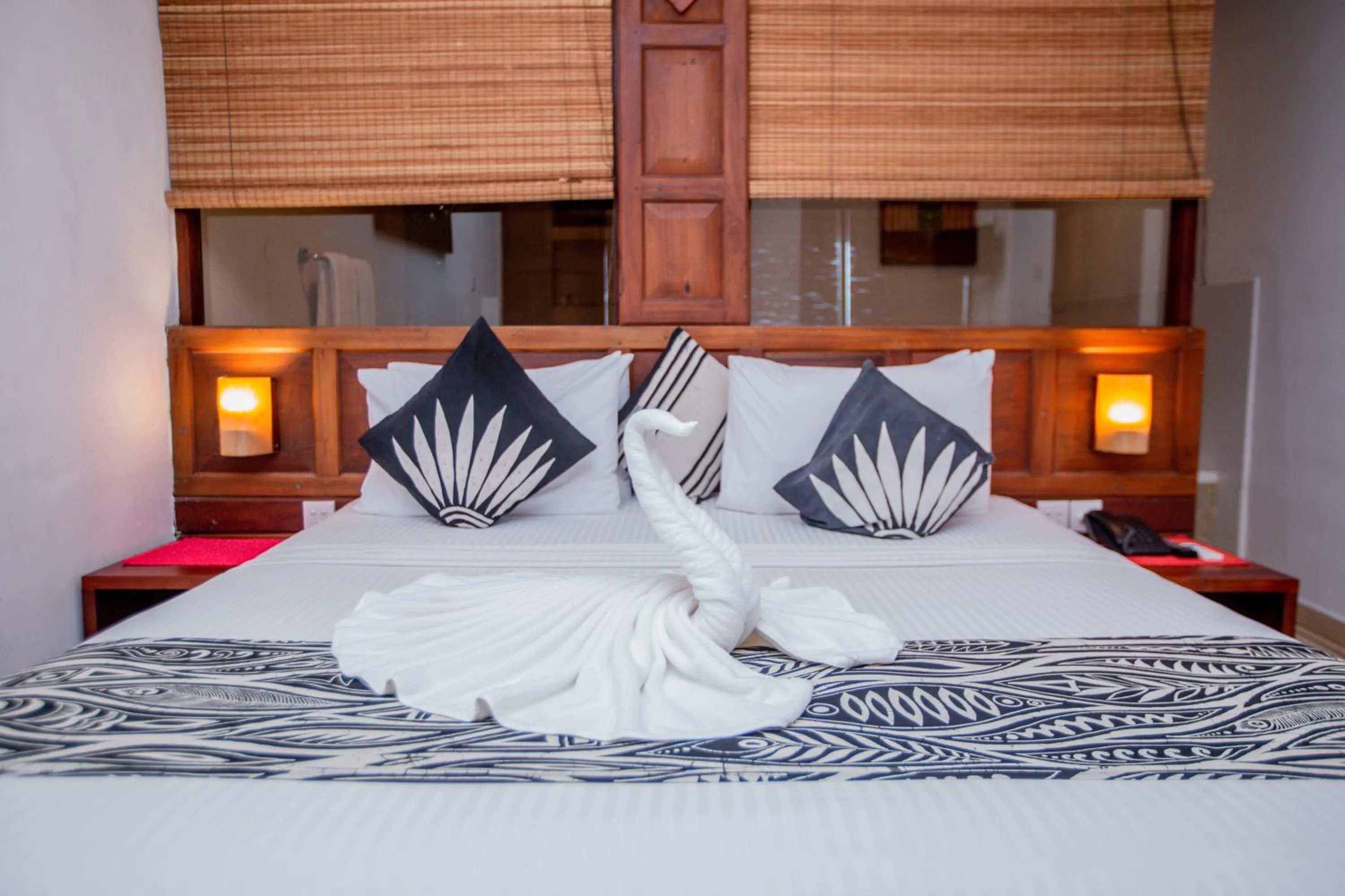 Bed in The Long Beach Resort & Spa