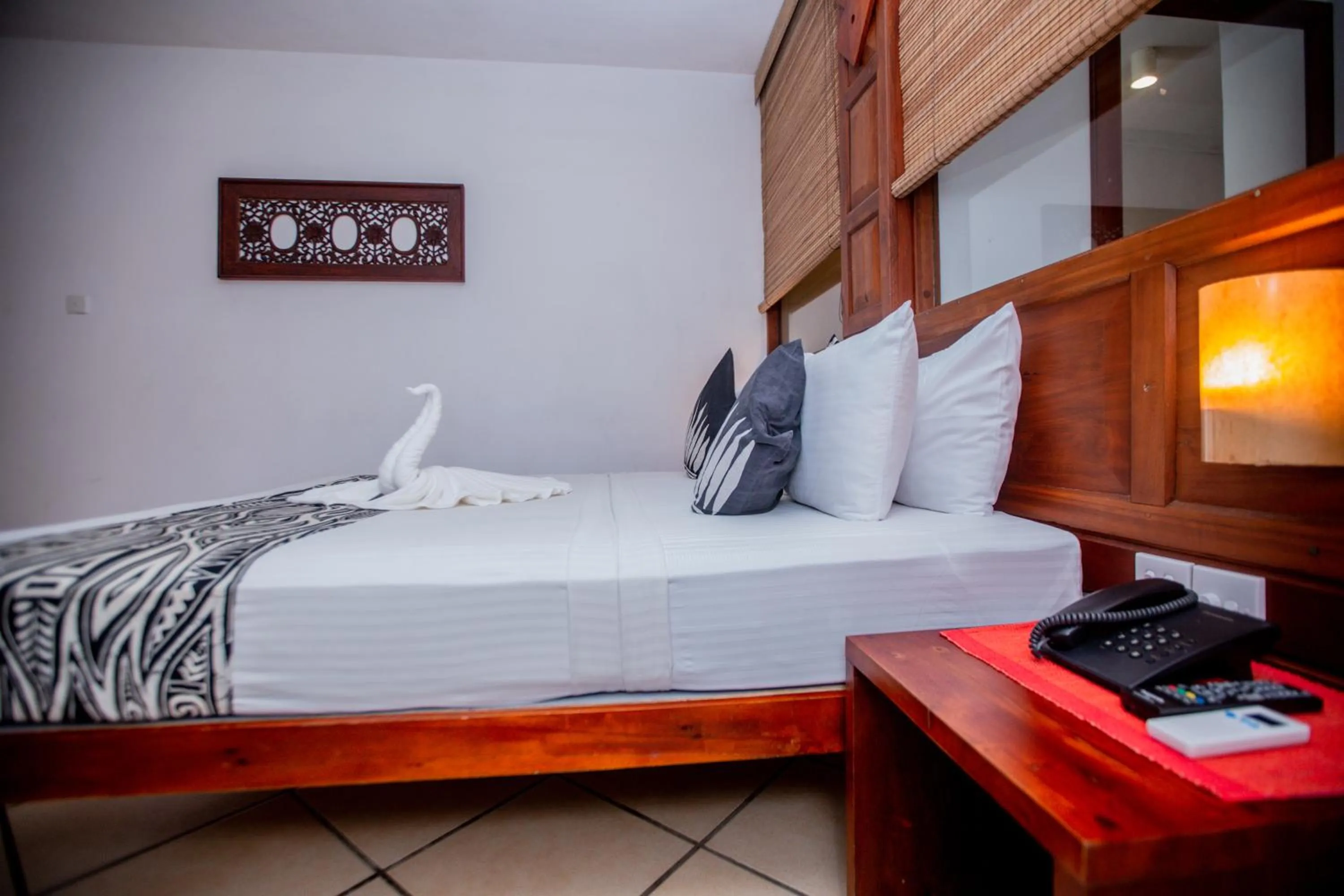 Bed in The Long Beach Resort & Spa