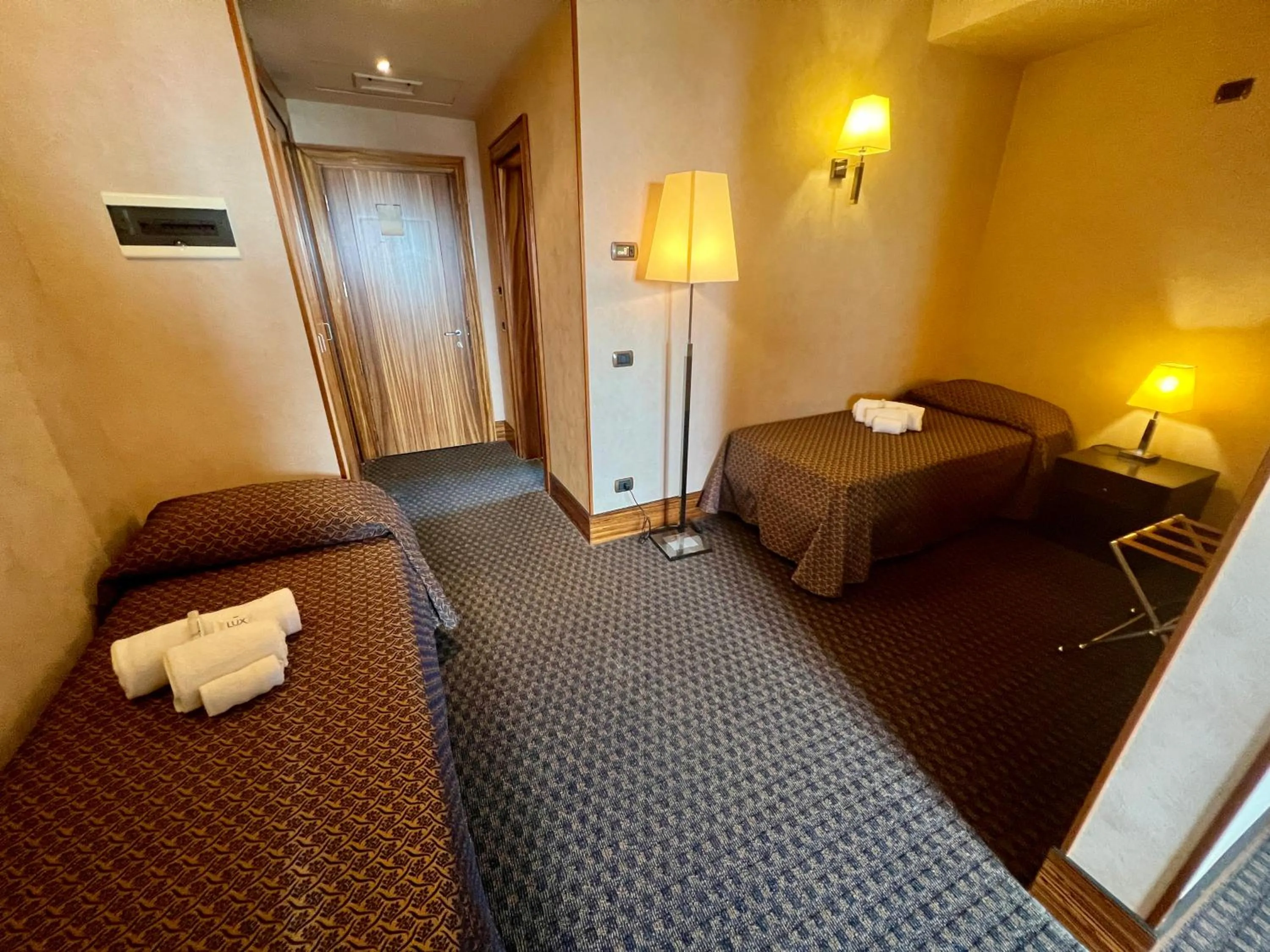 Bed in Hotel La Fenice