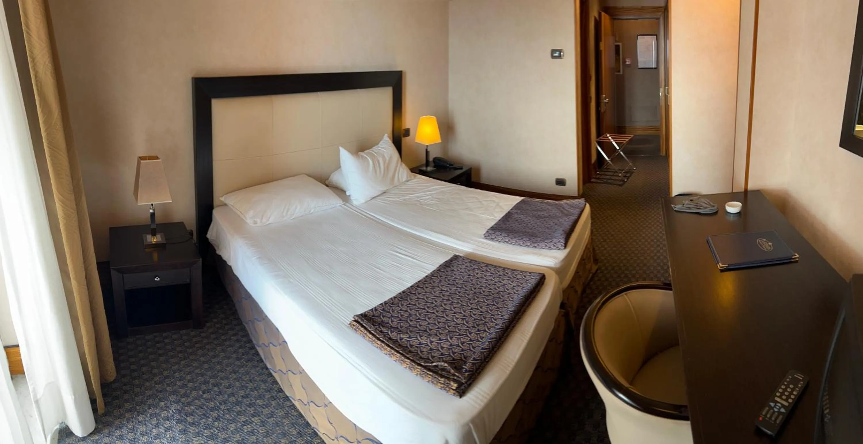 Bed in Hotel La Fenice