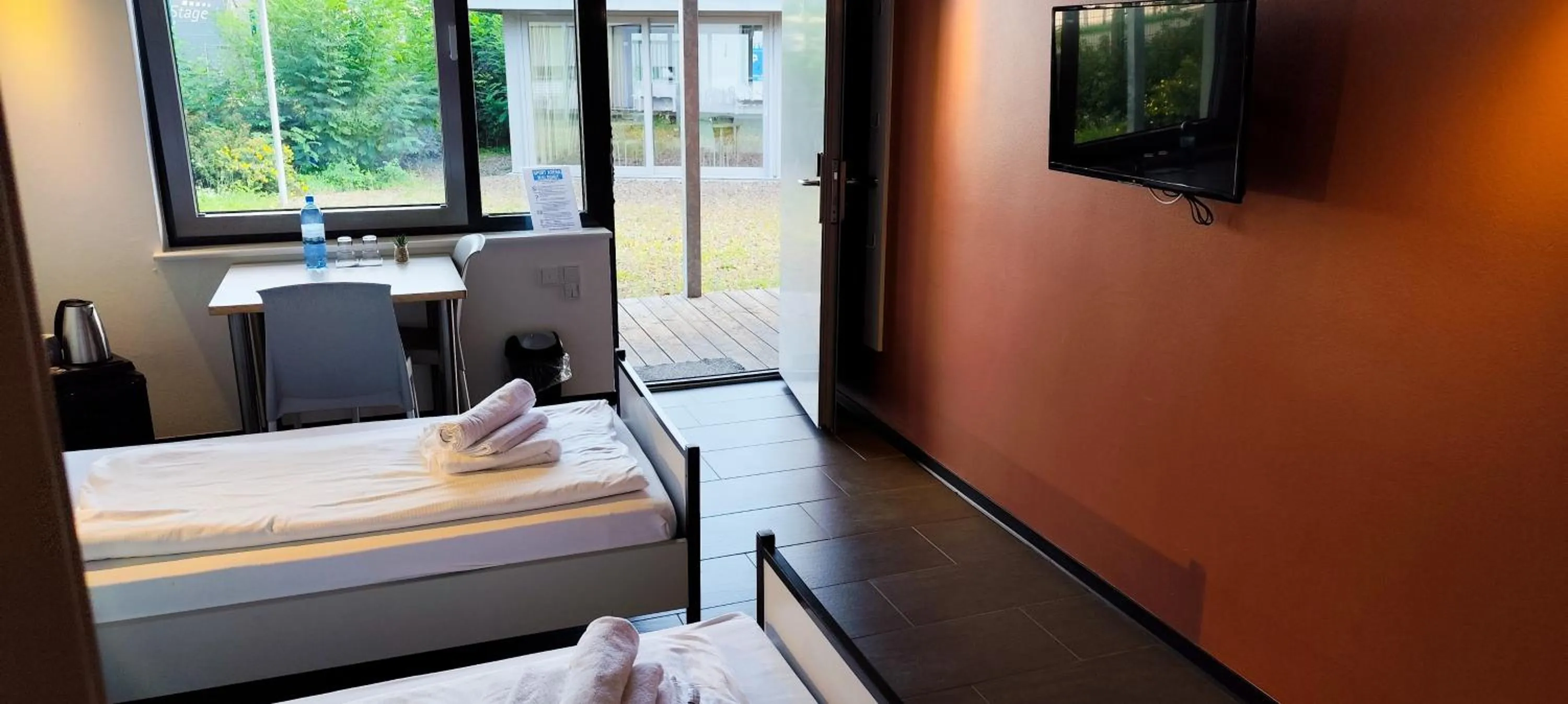 Photo of the whole room, Bed in Arena Hotel Waldshut